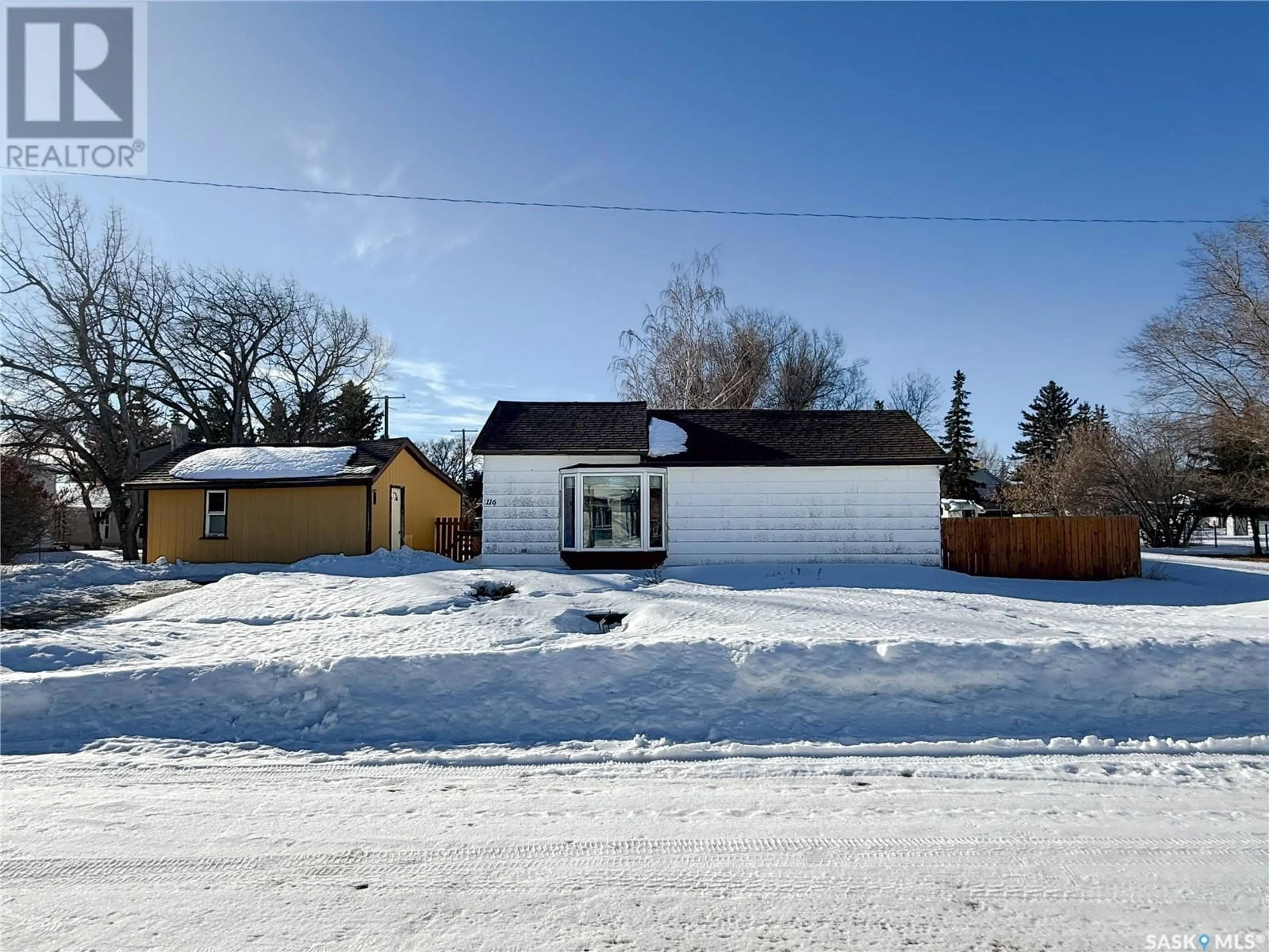 A pic from outside/outdoor area/front of a property/back of a property/a pic from drone, street for 116 Ash AVENUE N, Eastend Saskatchewan S0N0T0