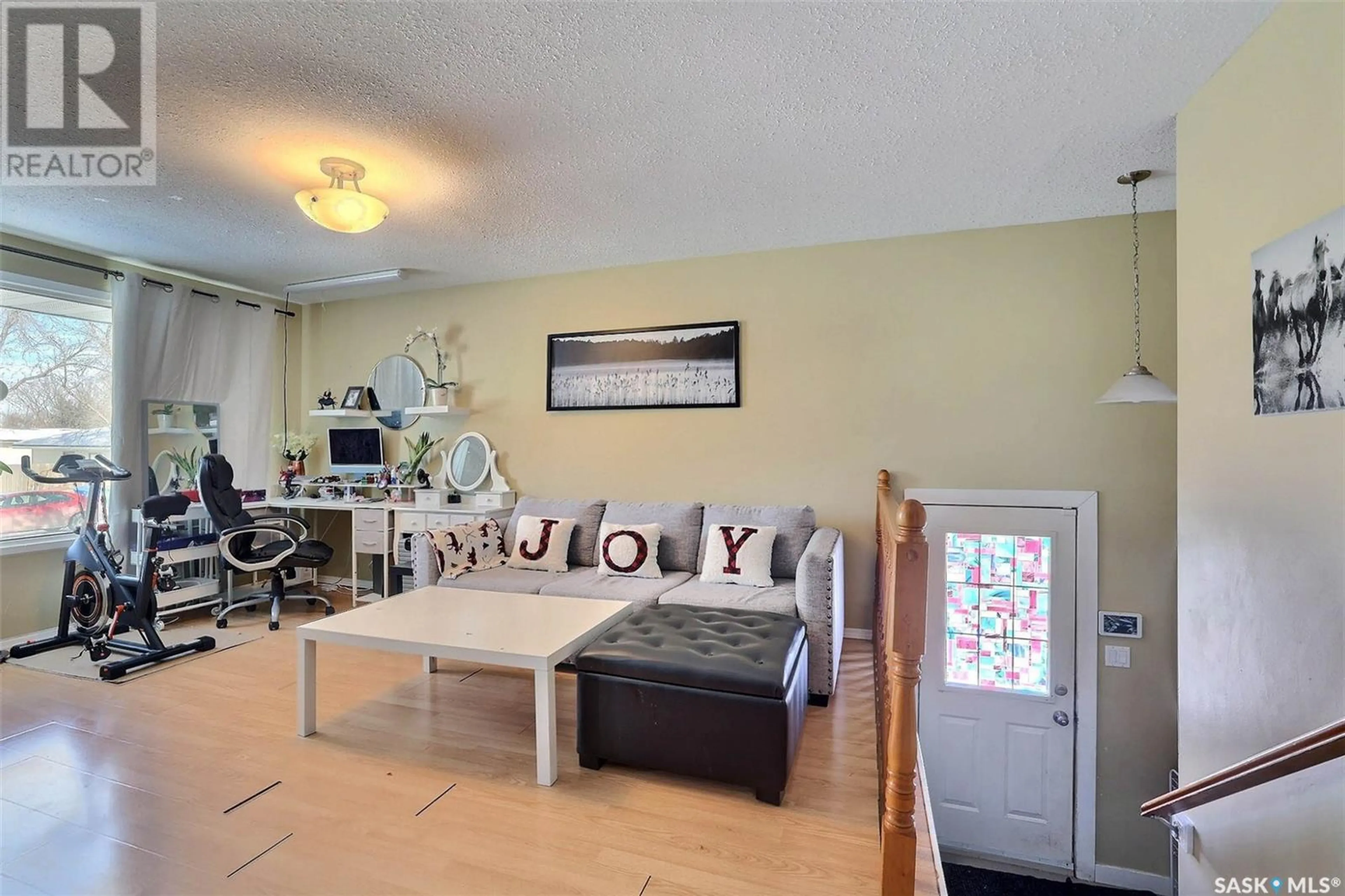 Living room with furniture, unknown for 115 CHURCH DRIVE, Regina Saskatchewan S4T6J5