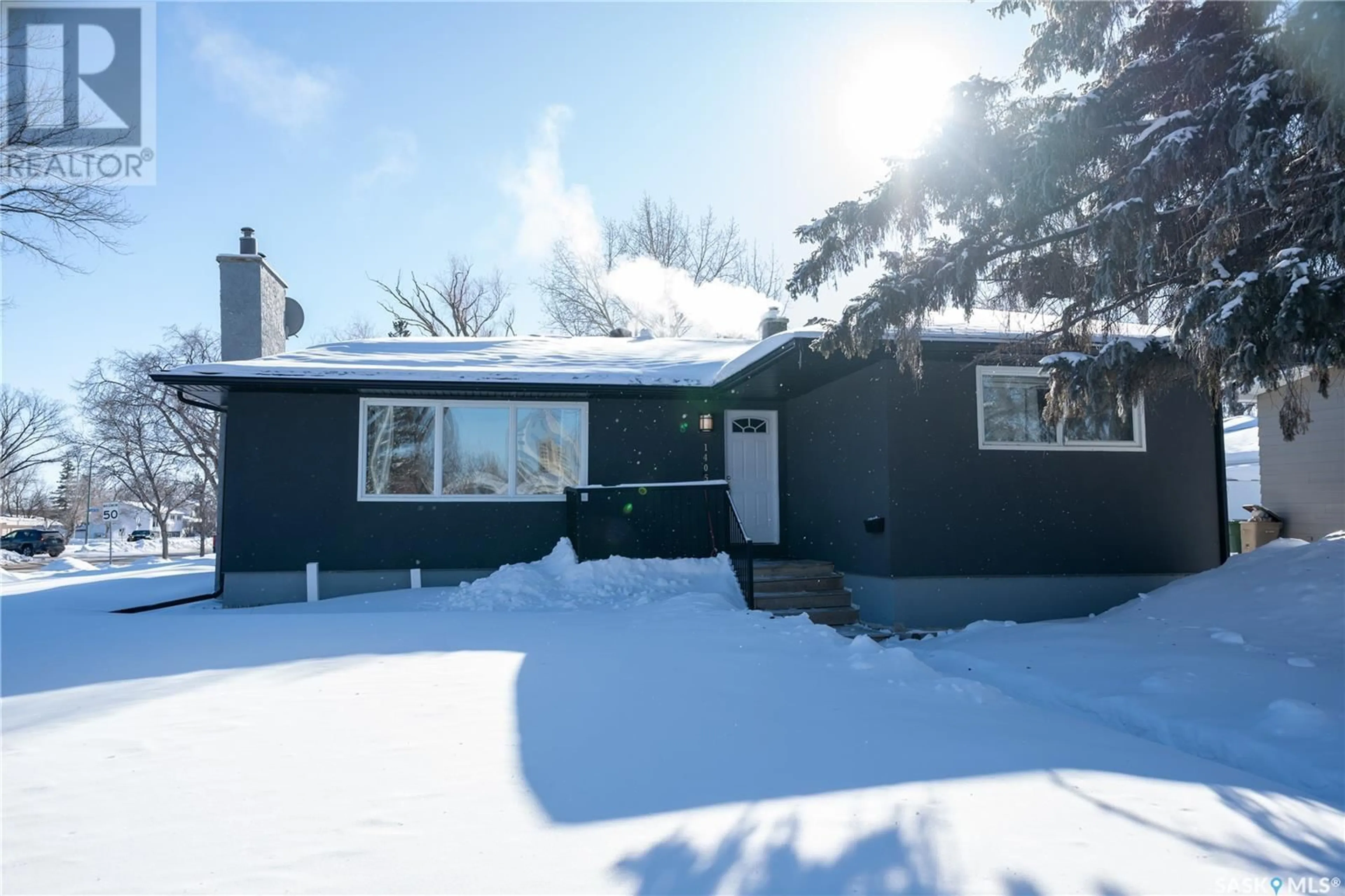 A pic from outside/outdoor area/front of a property/back of a property/a pic from drone, street for 1405 Macpherson AVENUE, Regina Saskatchewan S4S4E1