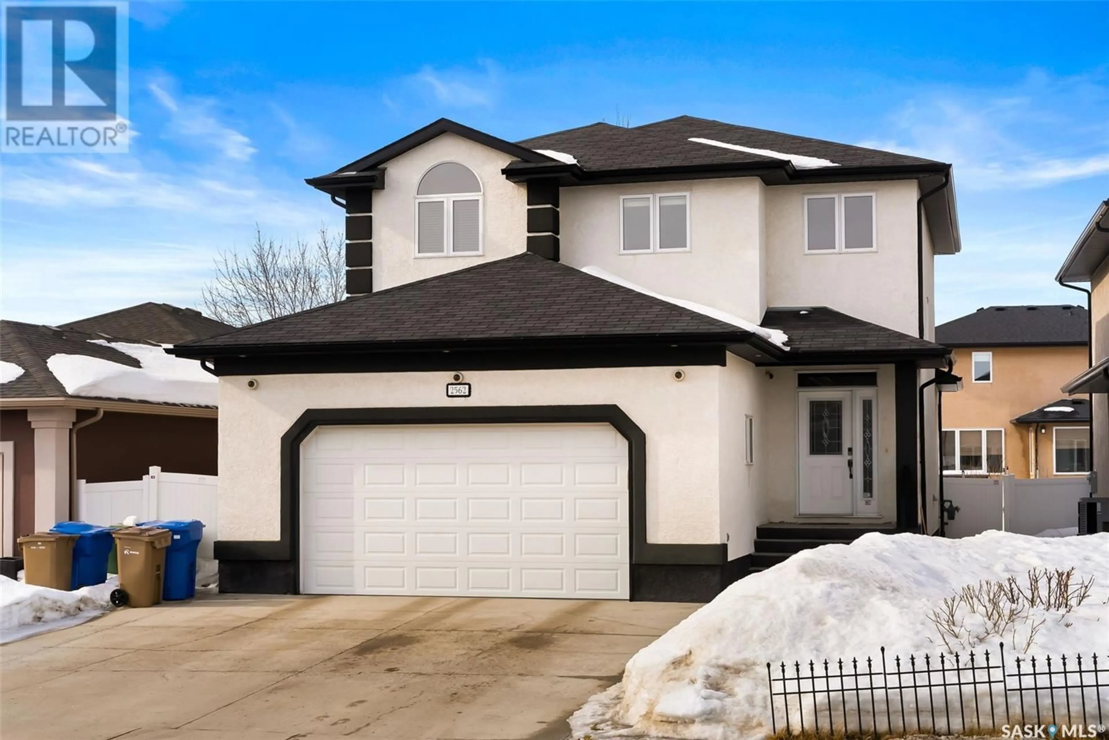 Home with vinyl exterior material, street for 2562 Windsor Park ROAD, Regina Saskatchewan S4V1K4