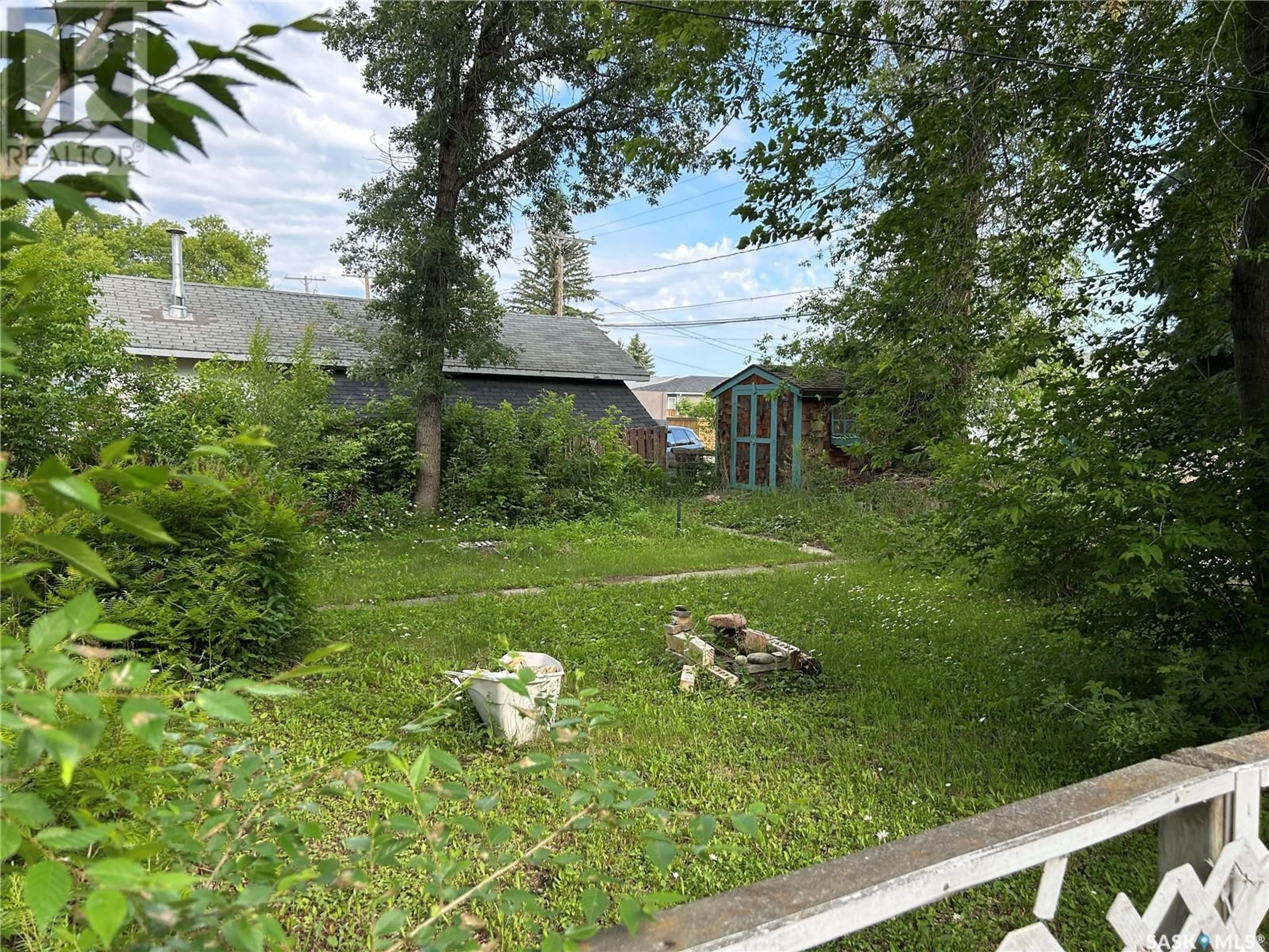 A pic from outside/outdoor area/front of a property/back of a property/a pic from drone, forest/trees view for 790 3RD STREET, Prince Albert Saskatchewan S6V0H8