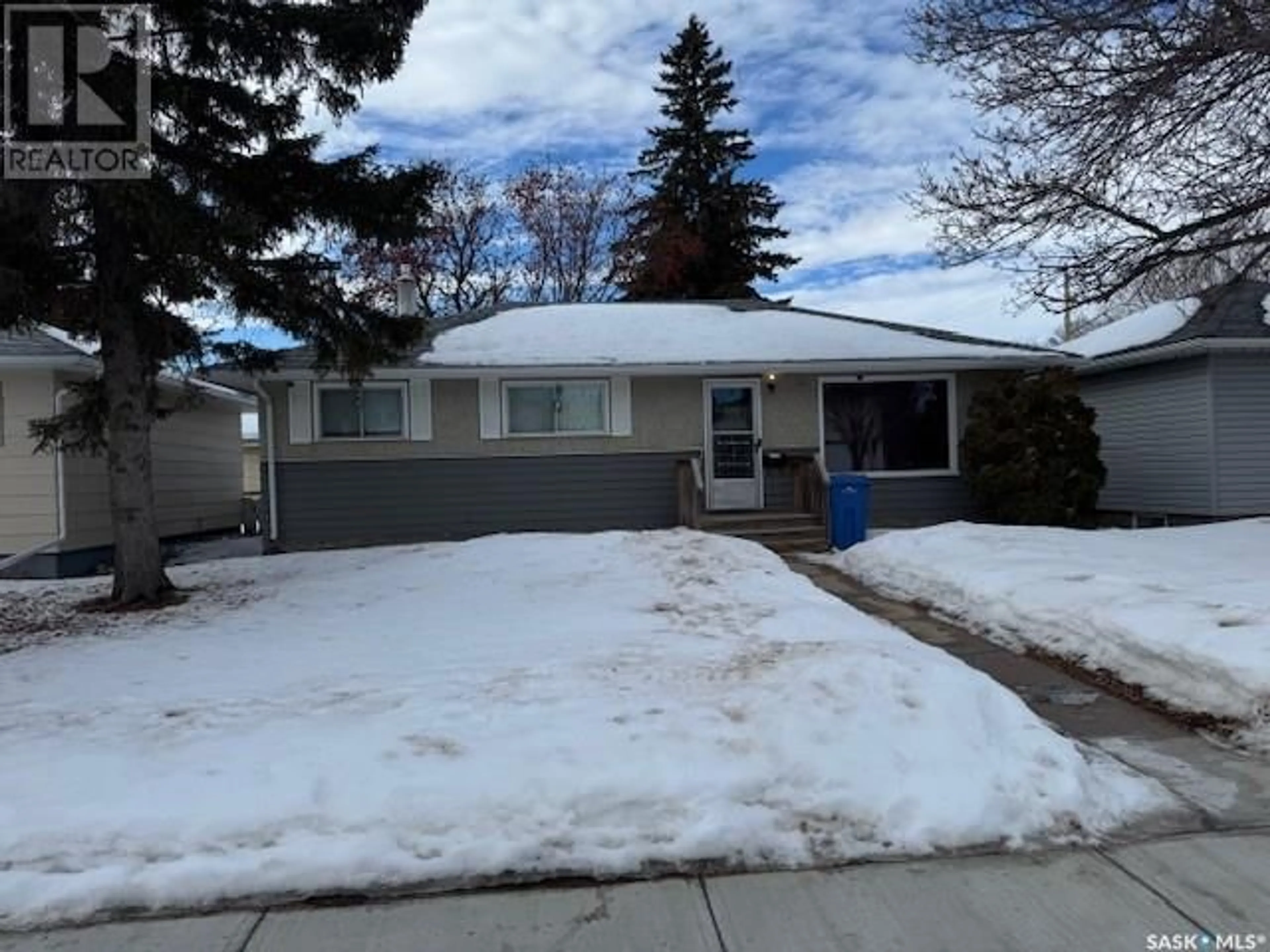 Home with vinyl exterior material, street for 1881 92nd STREET, North Battleford Saskatchewan S9A0B7