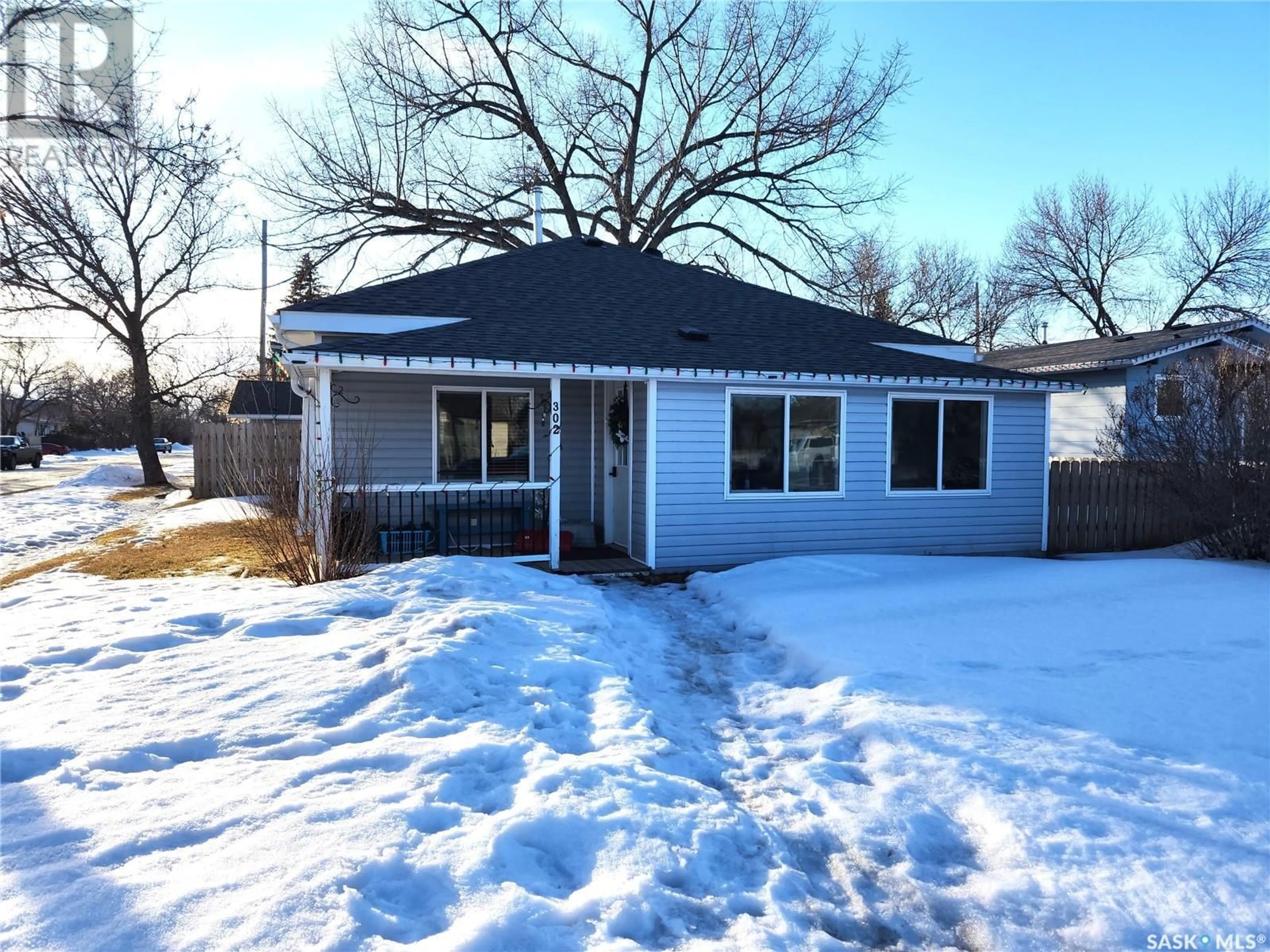 Home with vinyl exterior material, street for 302 Main STREET, Bienfait Saskatchewan S0C0M0