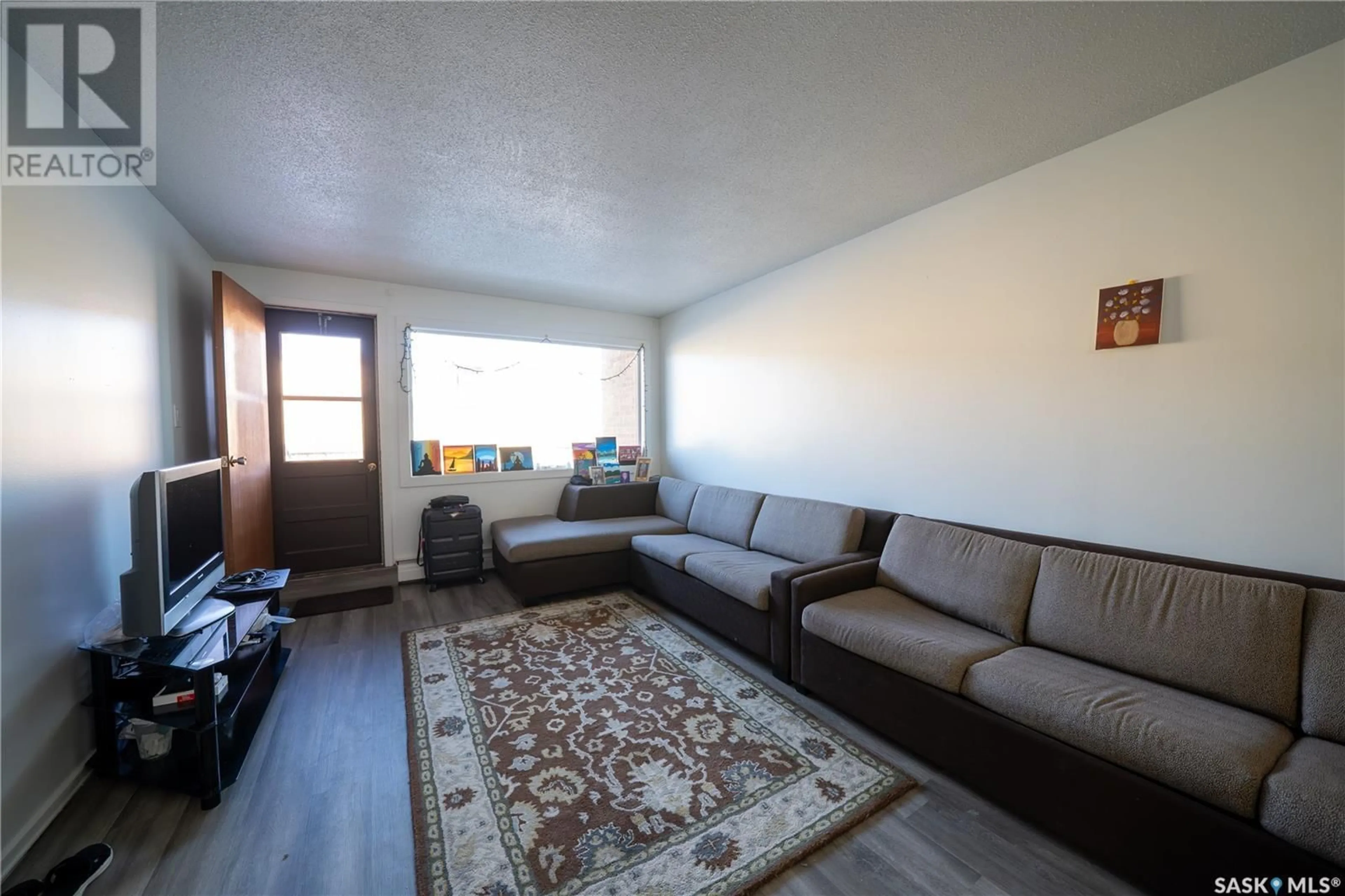 Living room with furniture, unknown for 6 4341 Rae STREET, Regina Saskatchewan S4S3B2