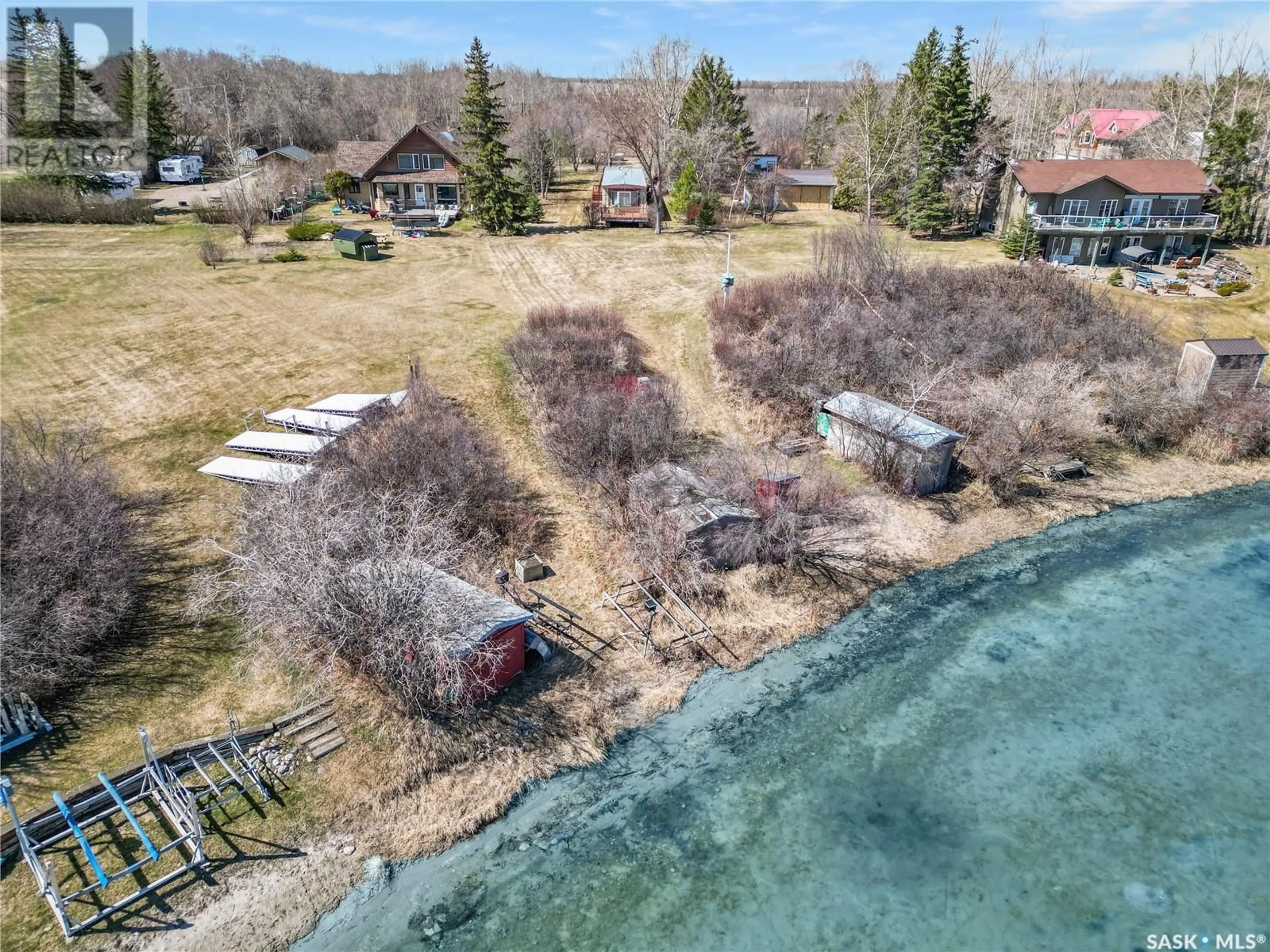 A pic from outside/outdoor area/front of a property/back of a property/a pic from drone, water/lake/river/ocean view for 57 3RD AVENUE, Metinota Saskatchewan S0M1X0