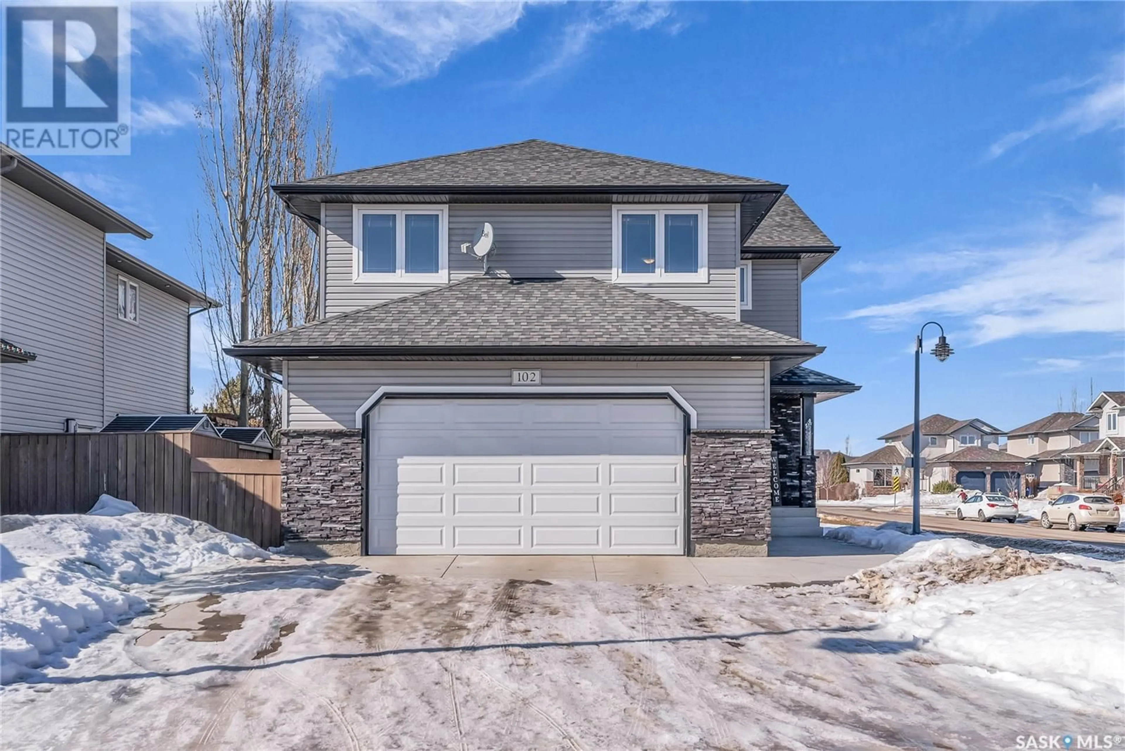 Home with brick exterior material, street for 102 Hettle COVE, Saskatoon Saskatchewan S7T0E8