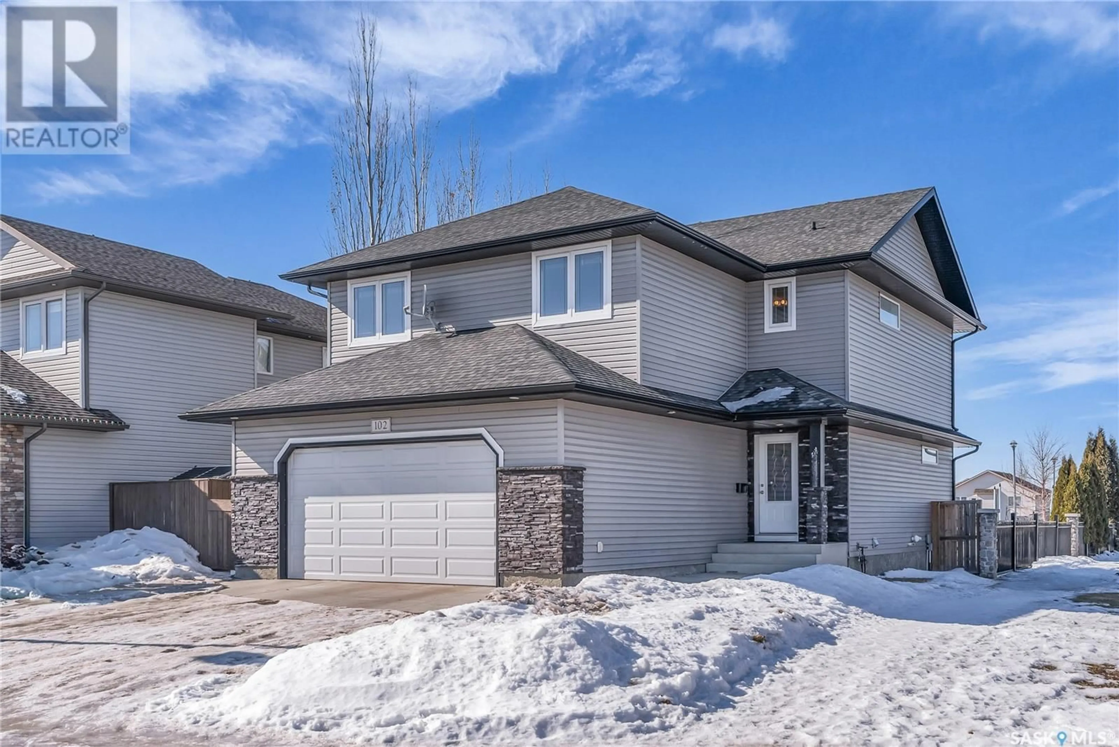 Home with brick exterior material, street for 102 Hettle COVE, Saskatoon Saskatchewan S7T0E8