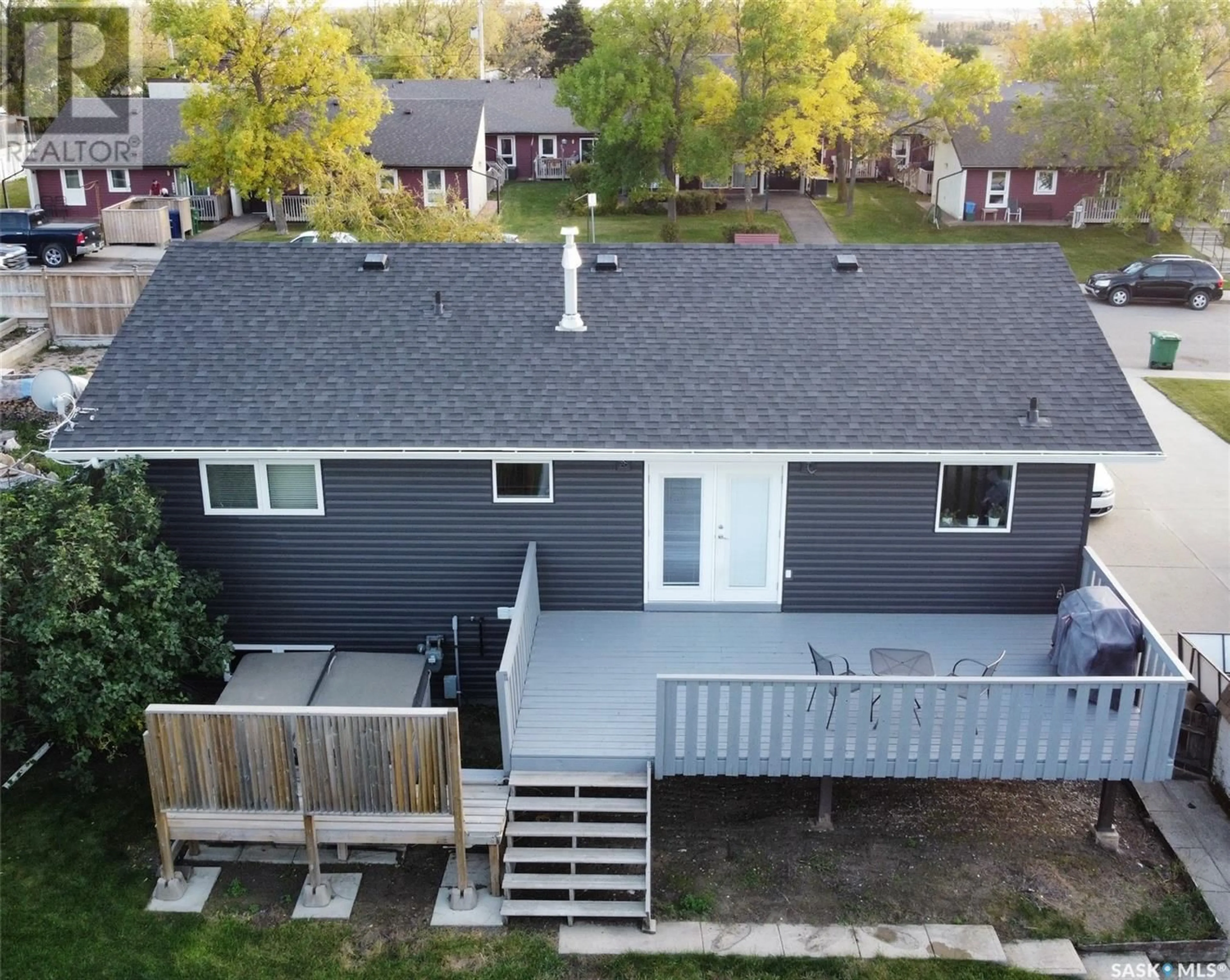 A pic from outside/outdoor area/front of a property/back of a property/a pic from drone, unknown for 405 3rd AVENUE W, Biggar Saskatchewan S0K0M0