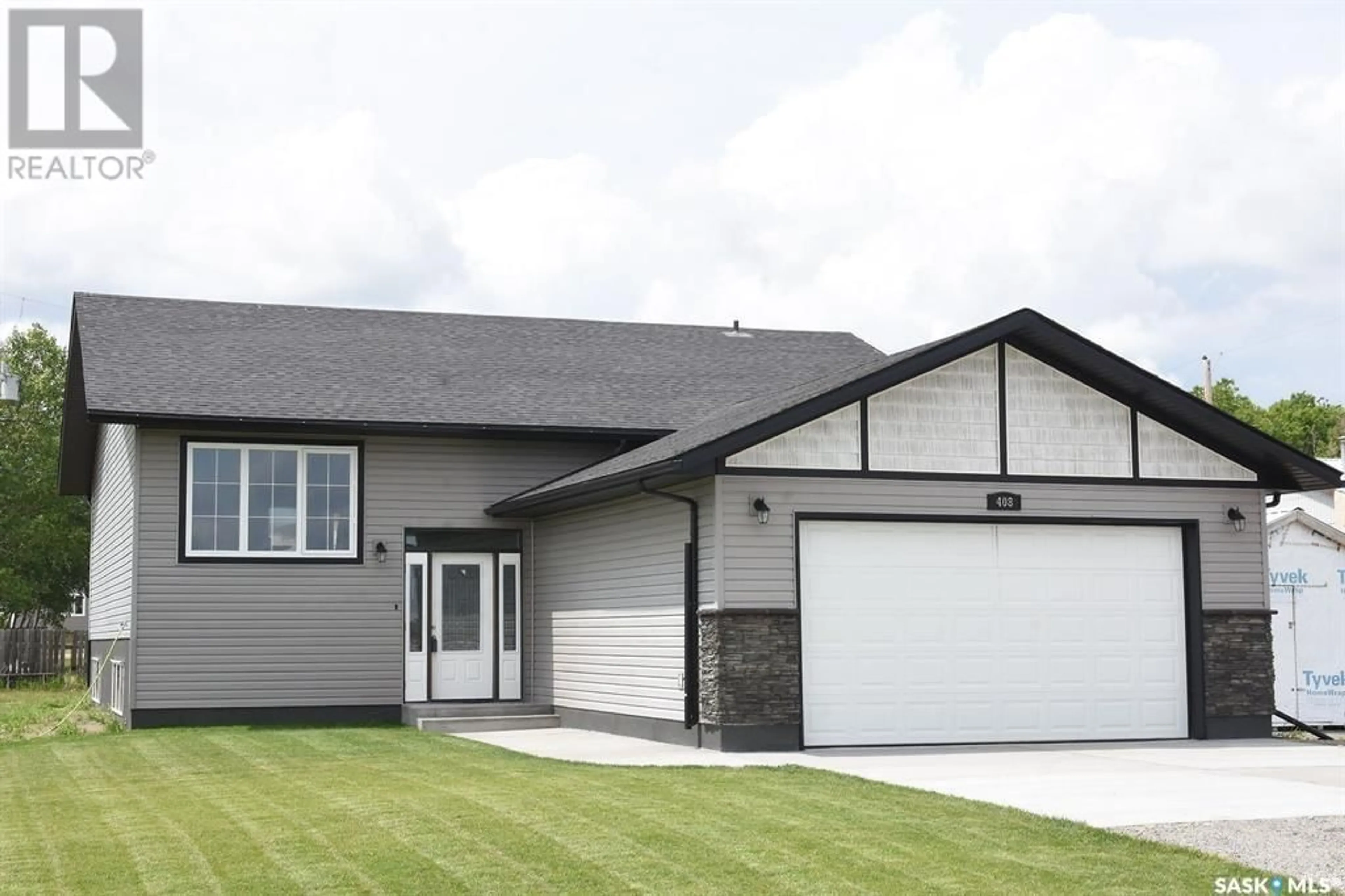 Home with vinyl exterior material, street for 408 Elder STREET, Pense Saskatchewan S0G3W0