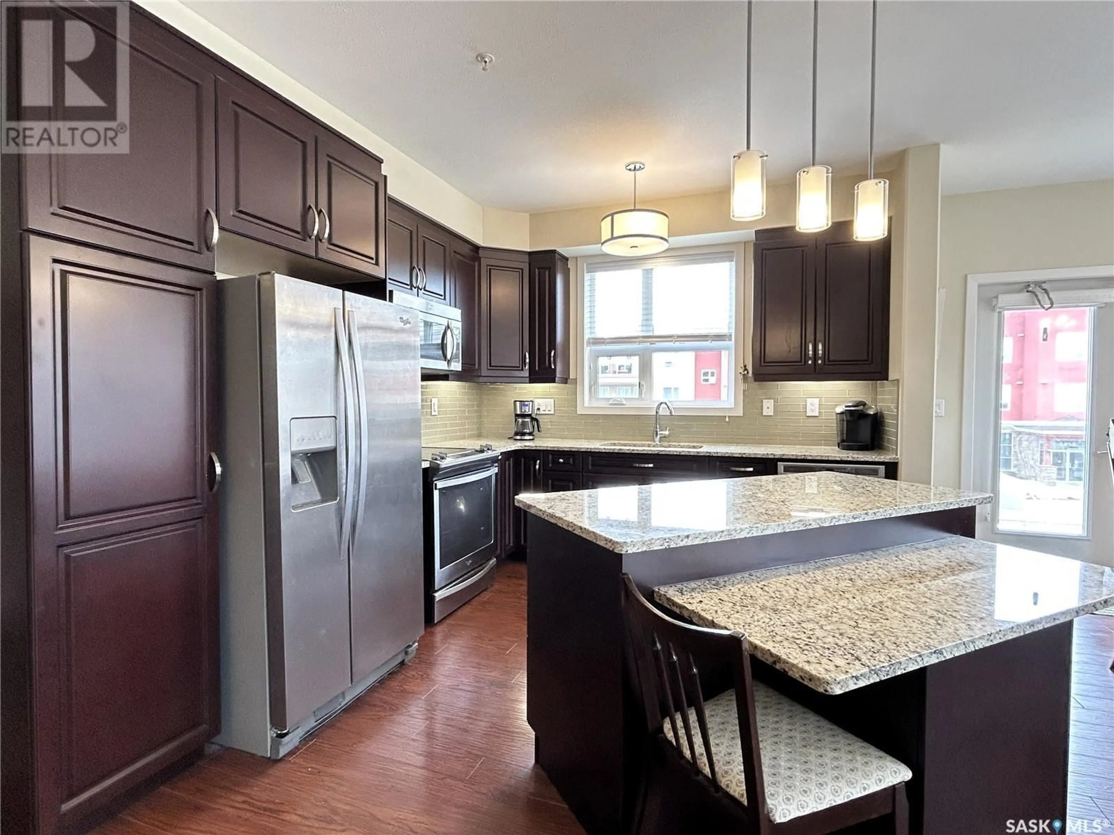 Open concept kitchen, unknown for 220 1025 Moss AVENUE, Saskatoon Saskatchewan S7H4C7