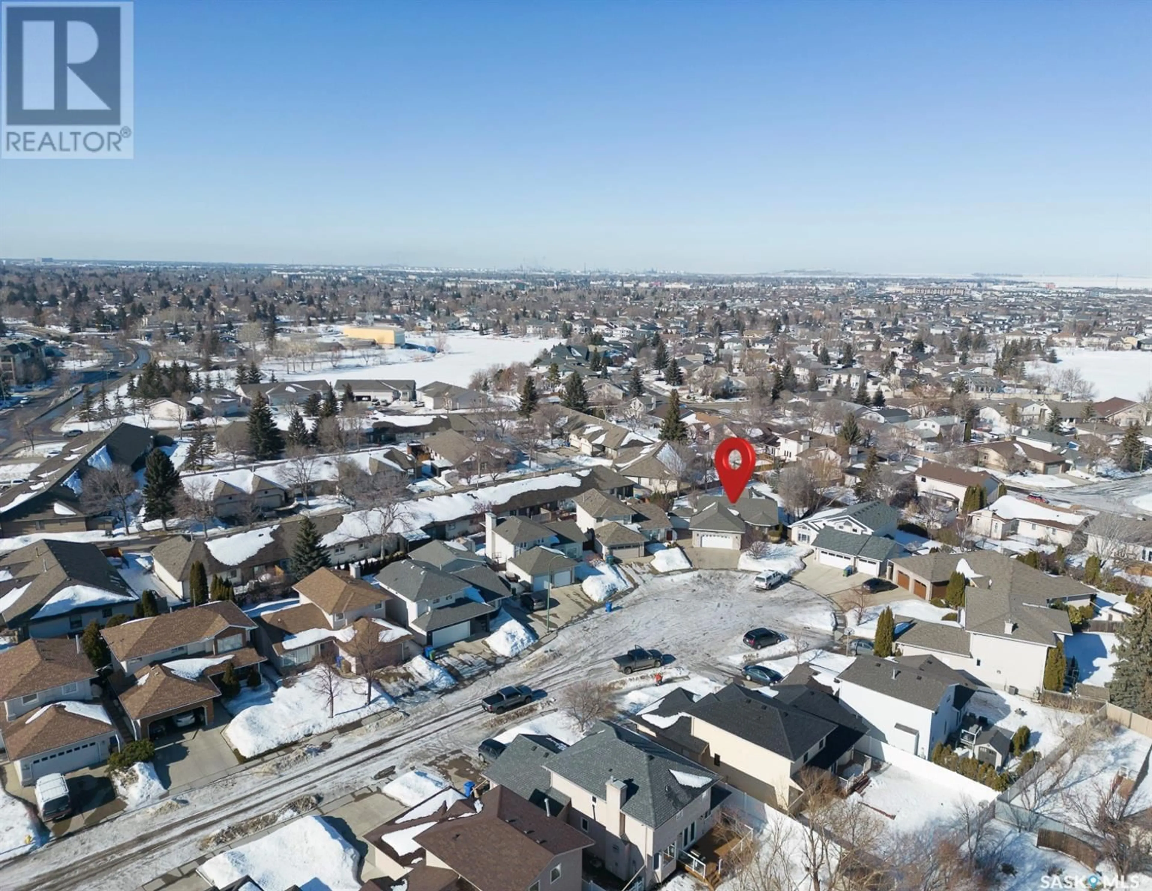 A pic from outside/outdoor area/front of a property/back of a property/a pic from drone, street for 3328 GLOUCESTER BAY, Regina Saskatchewan S4V2T9