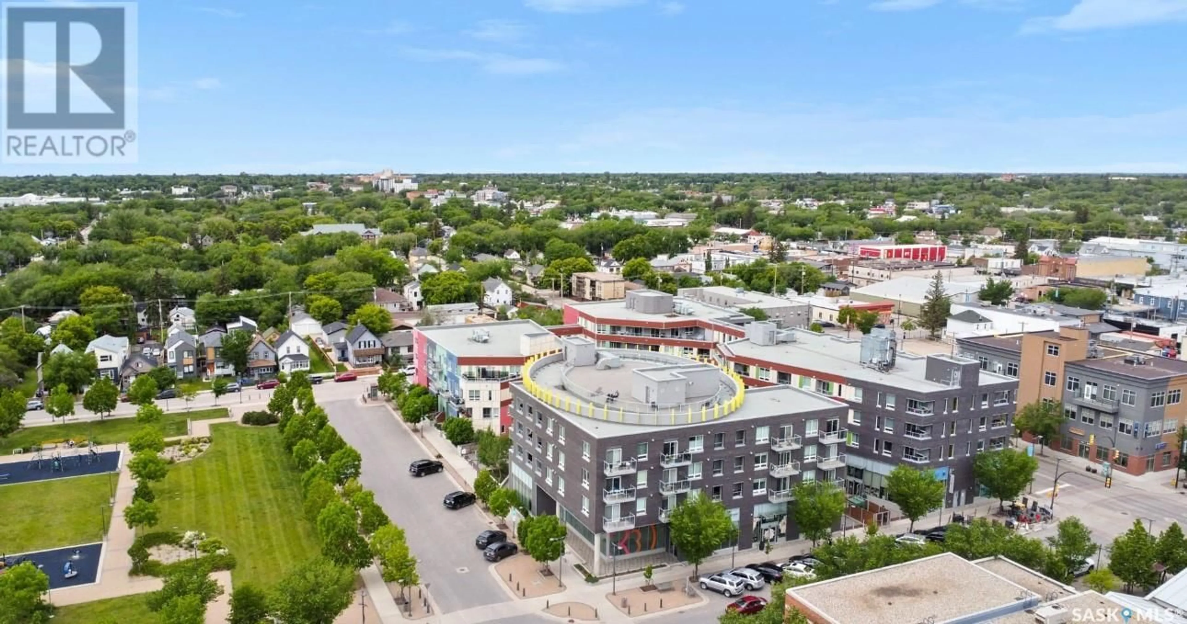 A pic from outside/outdoor area/front of a property/back of a property/a pic from drone, city buildings view from balcony for 319 404 C AVENUE S, Saskatoon Saskatchewan S7M5M9