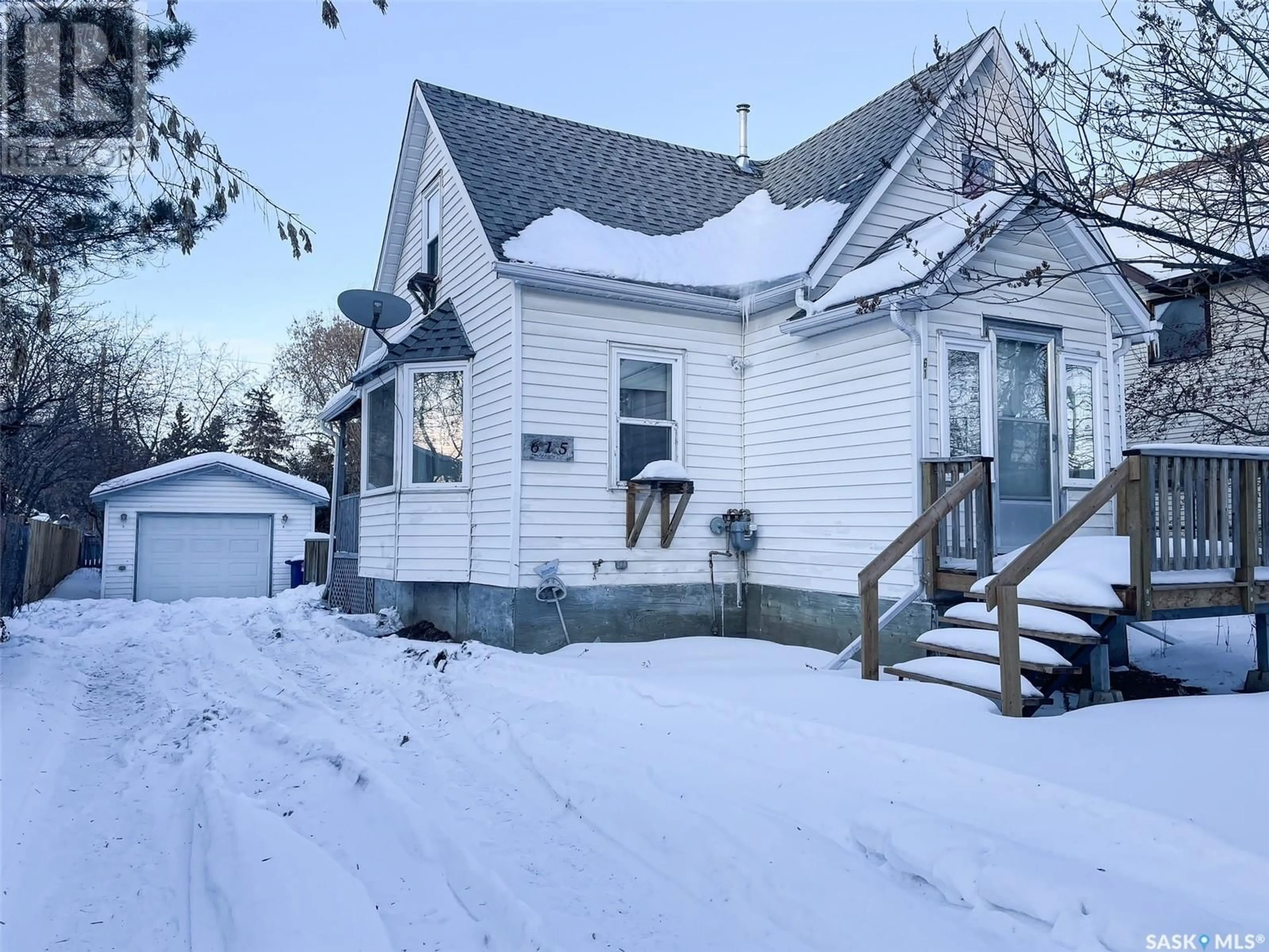 A pic from outside/outdoor area/front of a property/back of a property/a pic from drone, street for 615 4th AVENUE W, Meadow Lake Saskatchewan S9X1A6