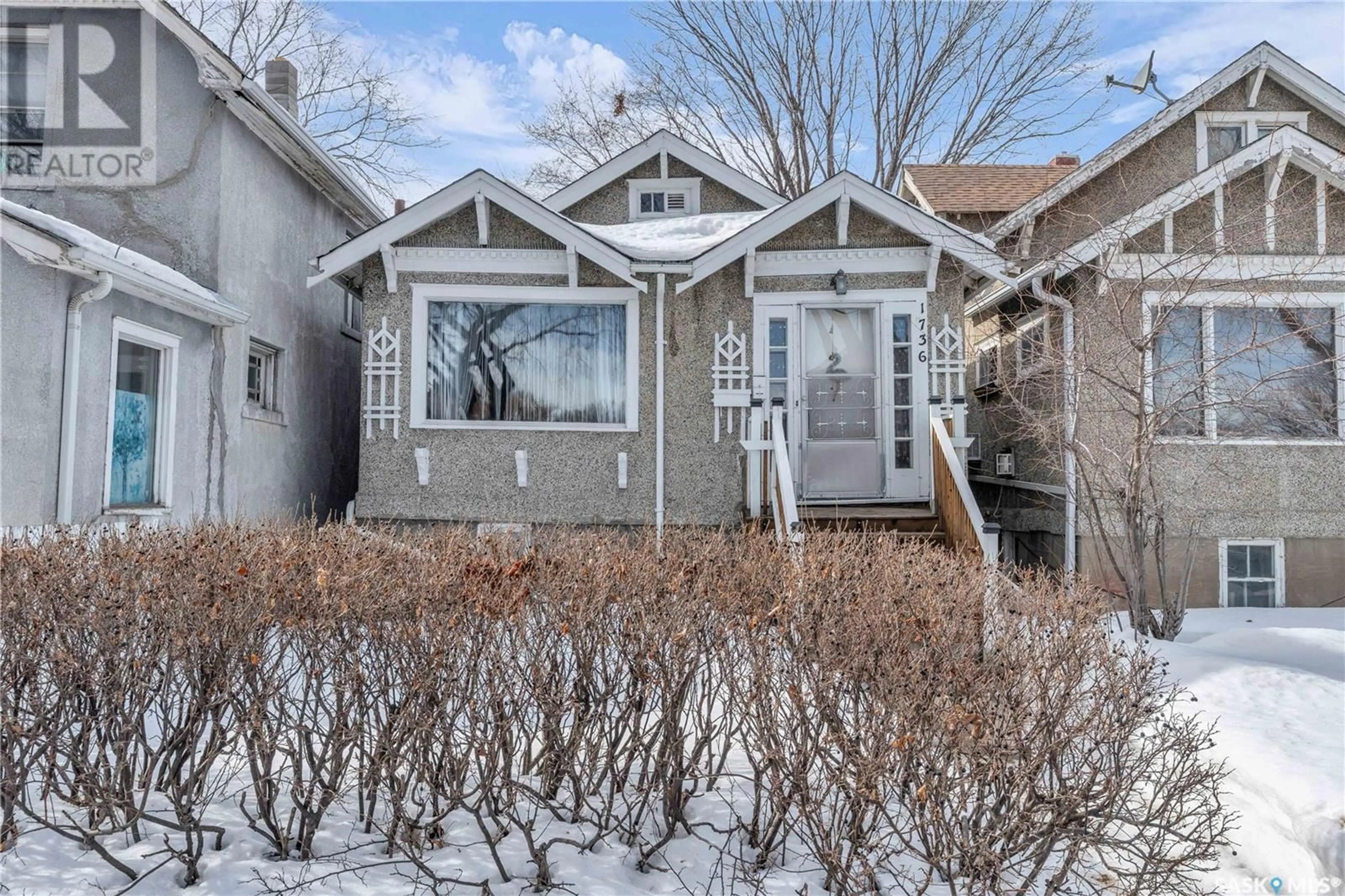 Home with vinyl exterior material, street for 1736 OTTAWA STREET, Regina Saskatchewan S4P1P2