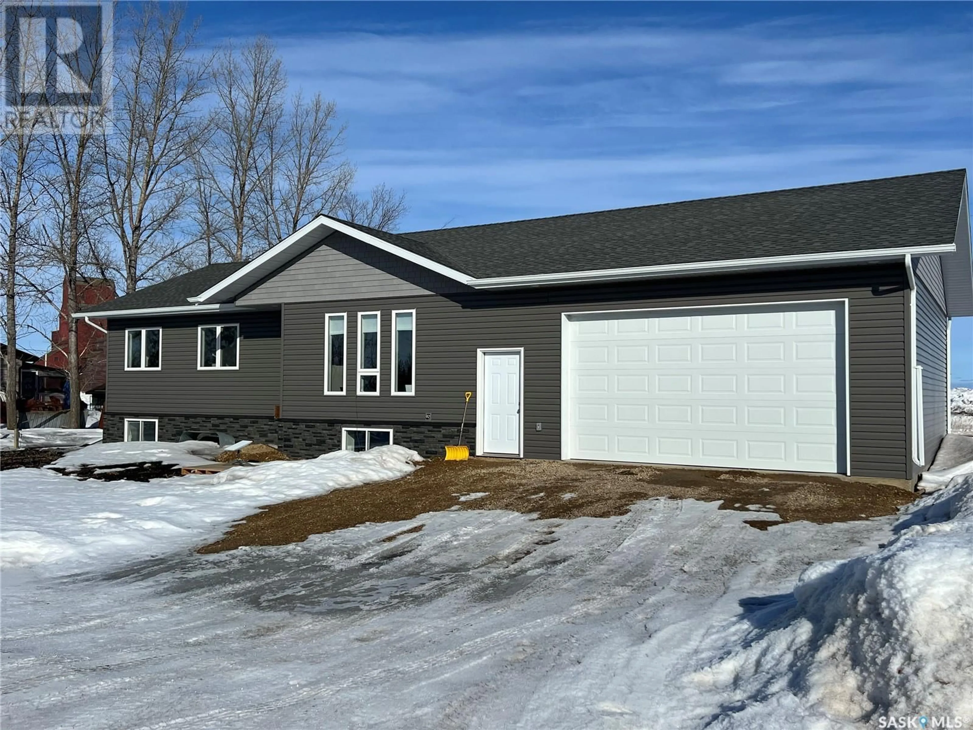 Home with vinyl exterior material, street for 109 First STREET, Beatty Saskatchewan S0J0C0