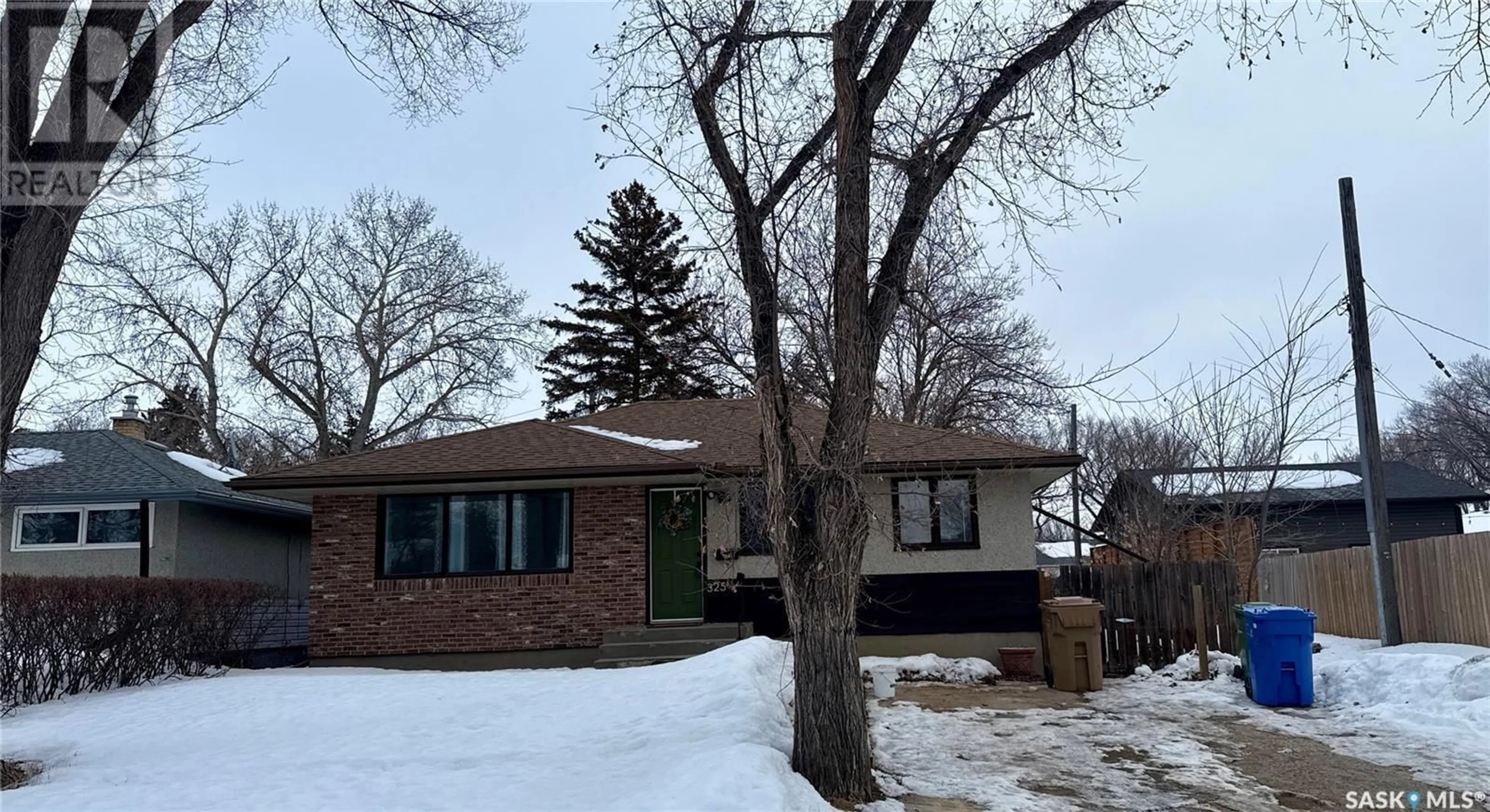 Home with brick exterior material, street for 325 HALIFAX STREET N, Regina Saskatchewan S4R2X1