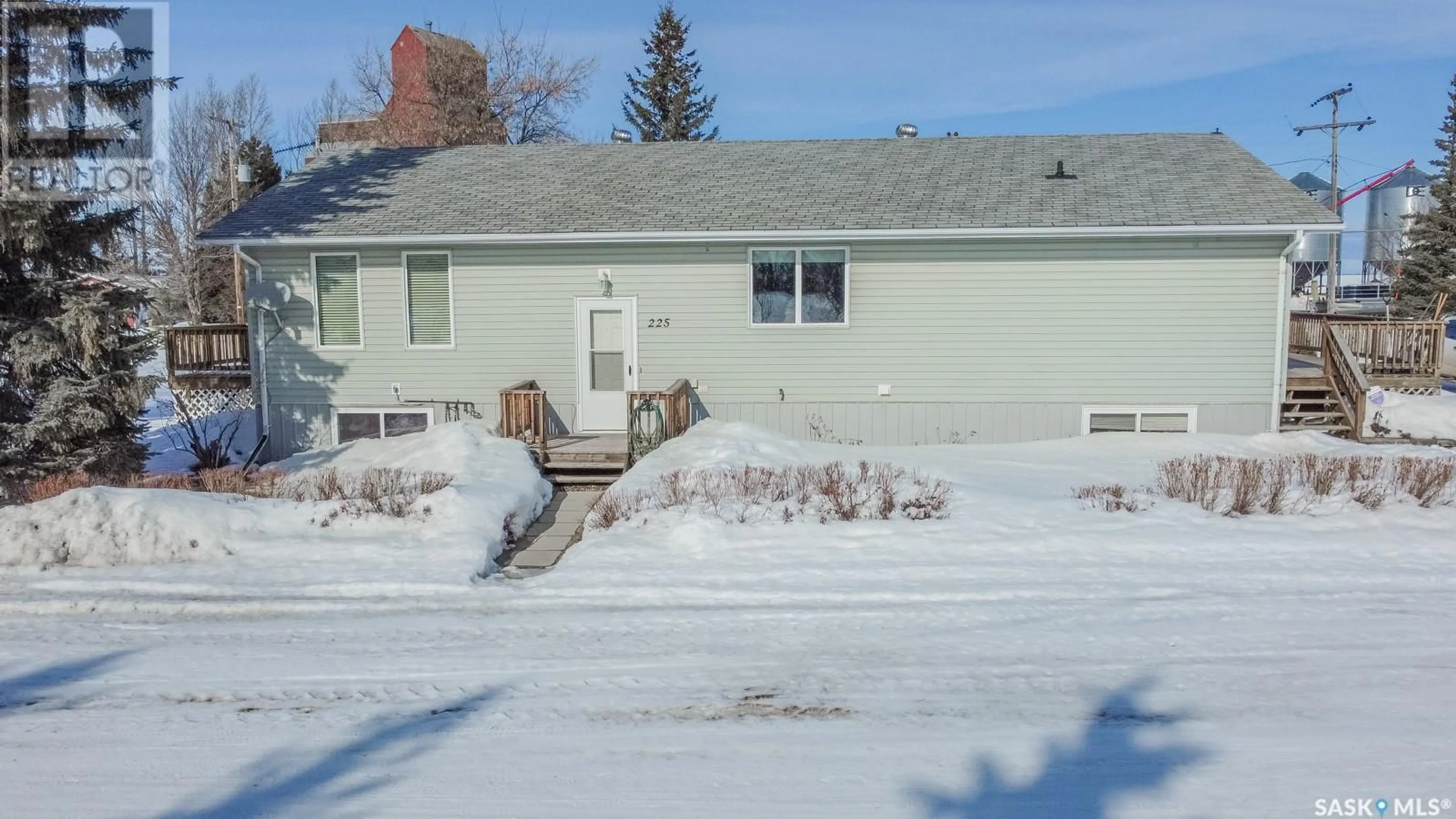 Home with vinyl exterior material, street for 225 1st STREET, Beatty Saskatchewan S0J0C0