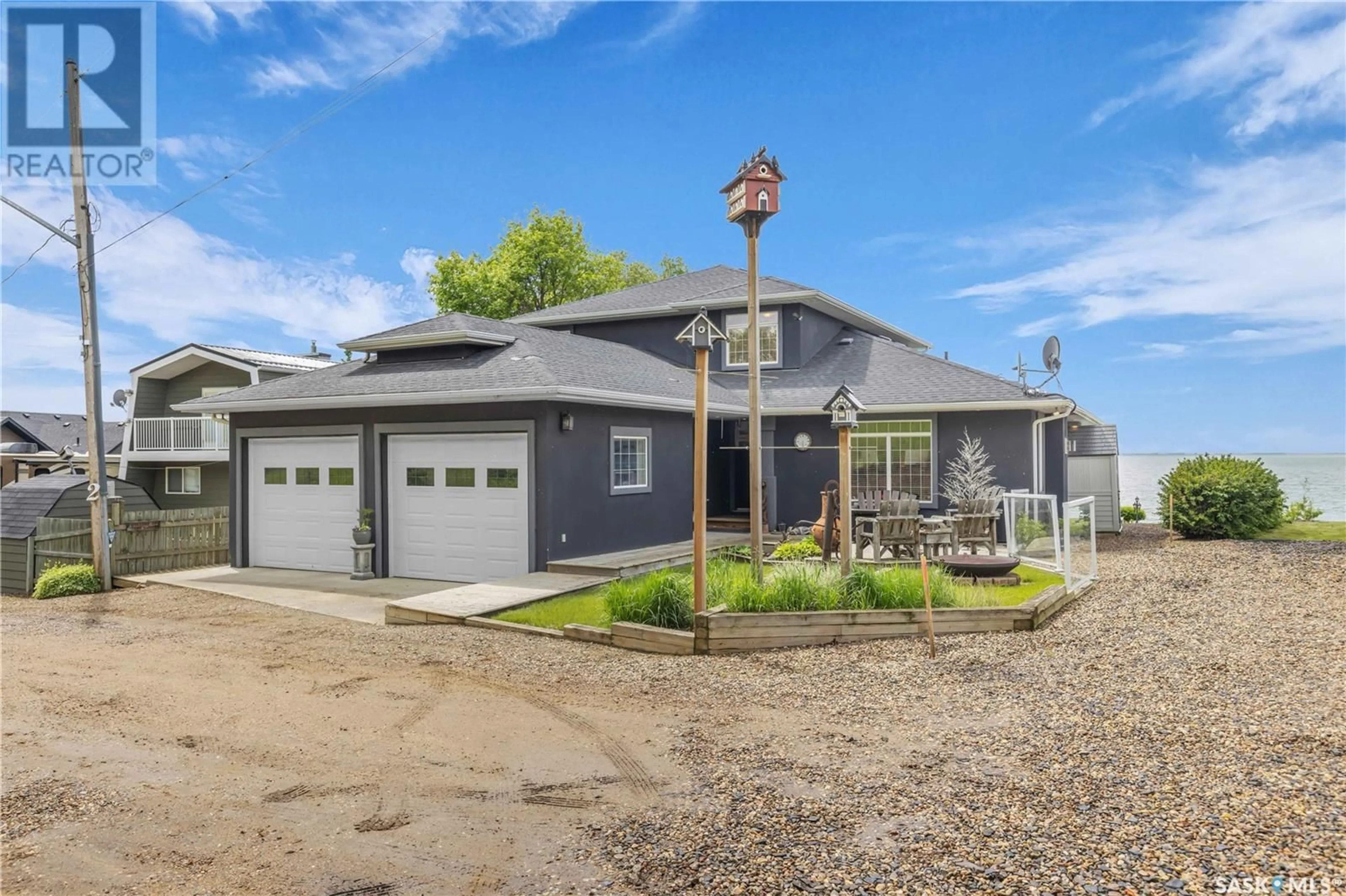 Home with vinyl exterior material, street for 2 JACKFISH LAKE CRESCENT, Jackfish Lake Saskatchewan S0M1X0