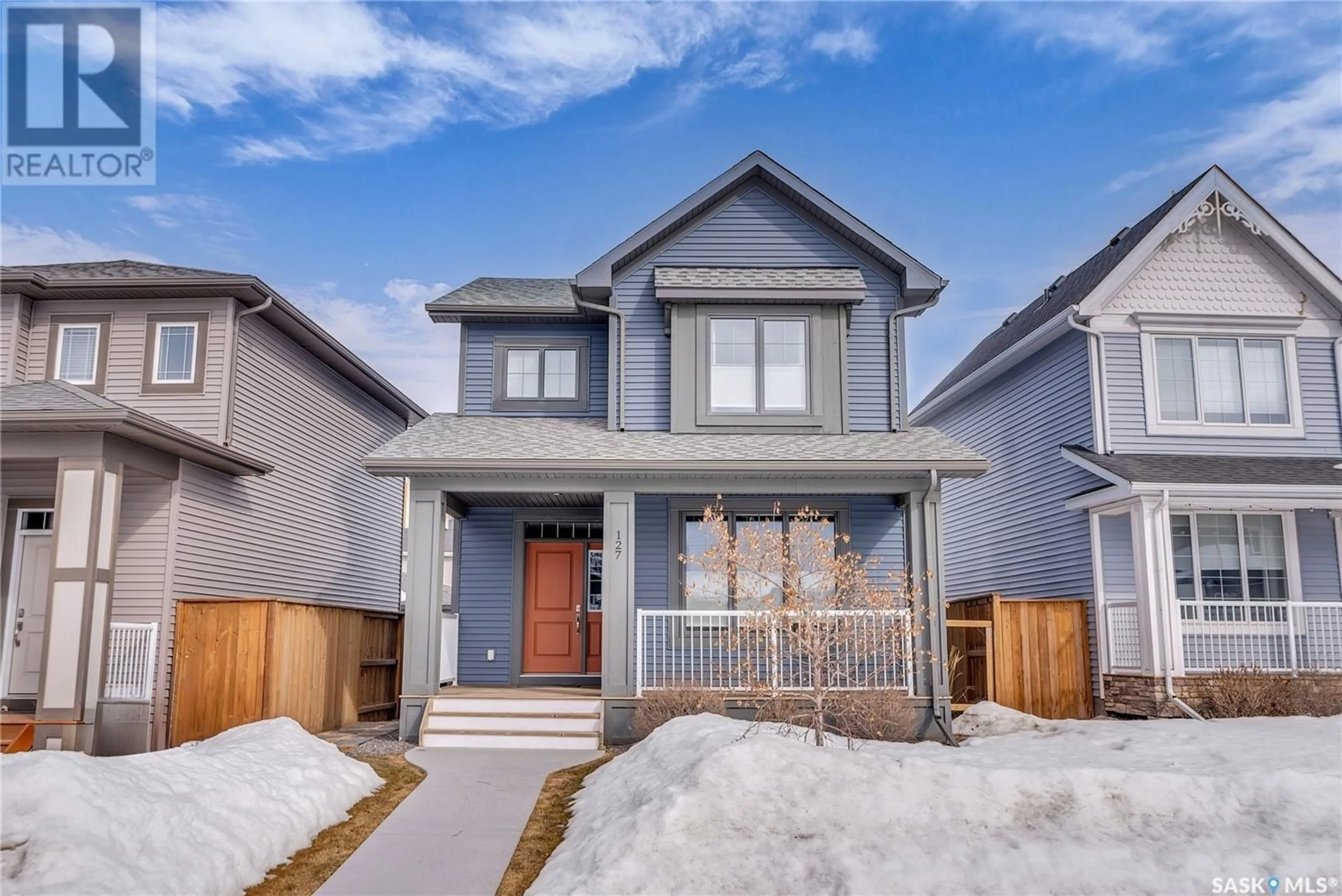Home with vinyl exterior material, street for 127 NEWTON WAY, Saskatoon Saskatchewan S7V0N6