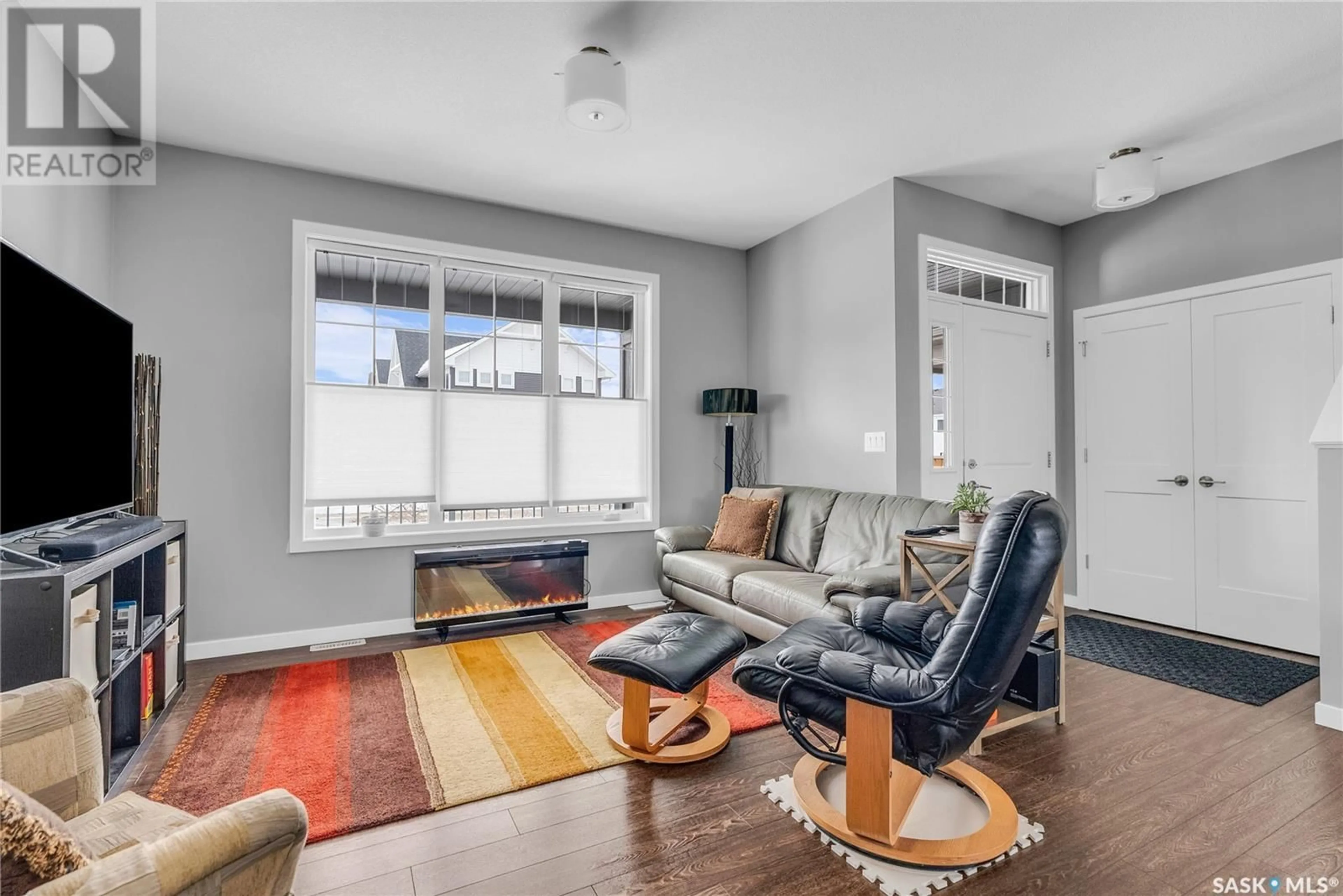 Living room with furniture, unknown for 127 NEWTON WAY, Saskatoon Saskatchewan S7V0N6