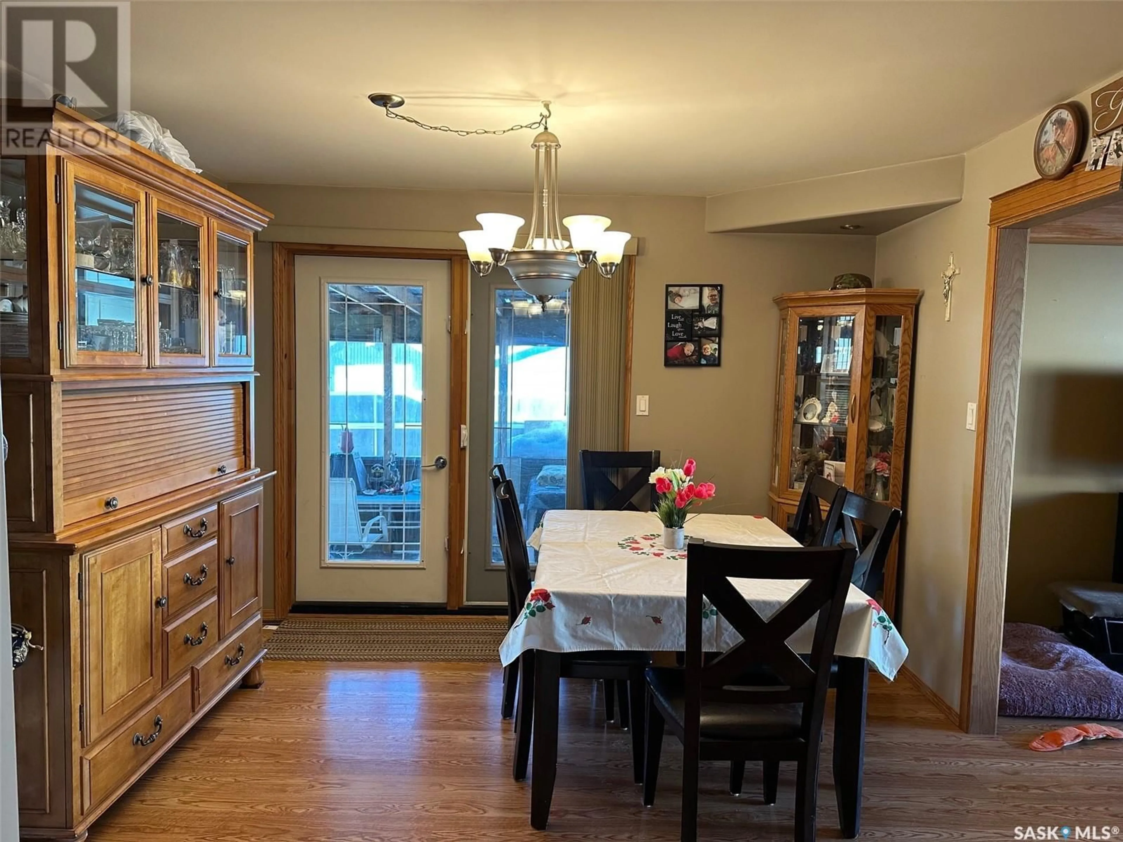 Dining room, wood/laminate floor for 238 YOUNG STREET, Bienfait Saskatchewan S0C0M0