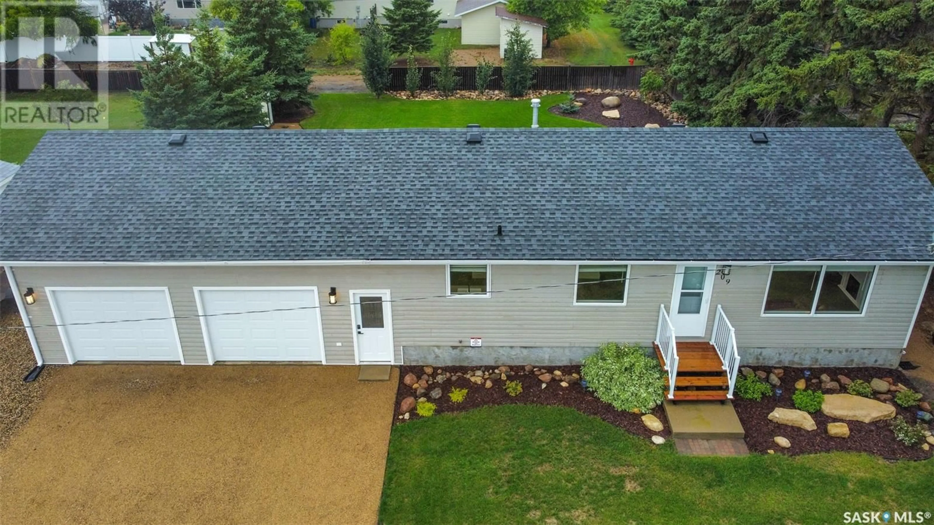 A pic from outside/outdoor area/front of a property/back of a property/a pic from drone, street for 209 4TH AVENUE, St. Brieux Saskatchewan S0K3V0