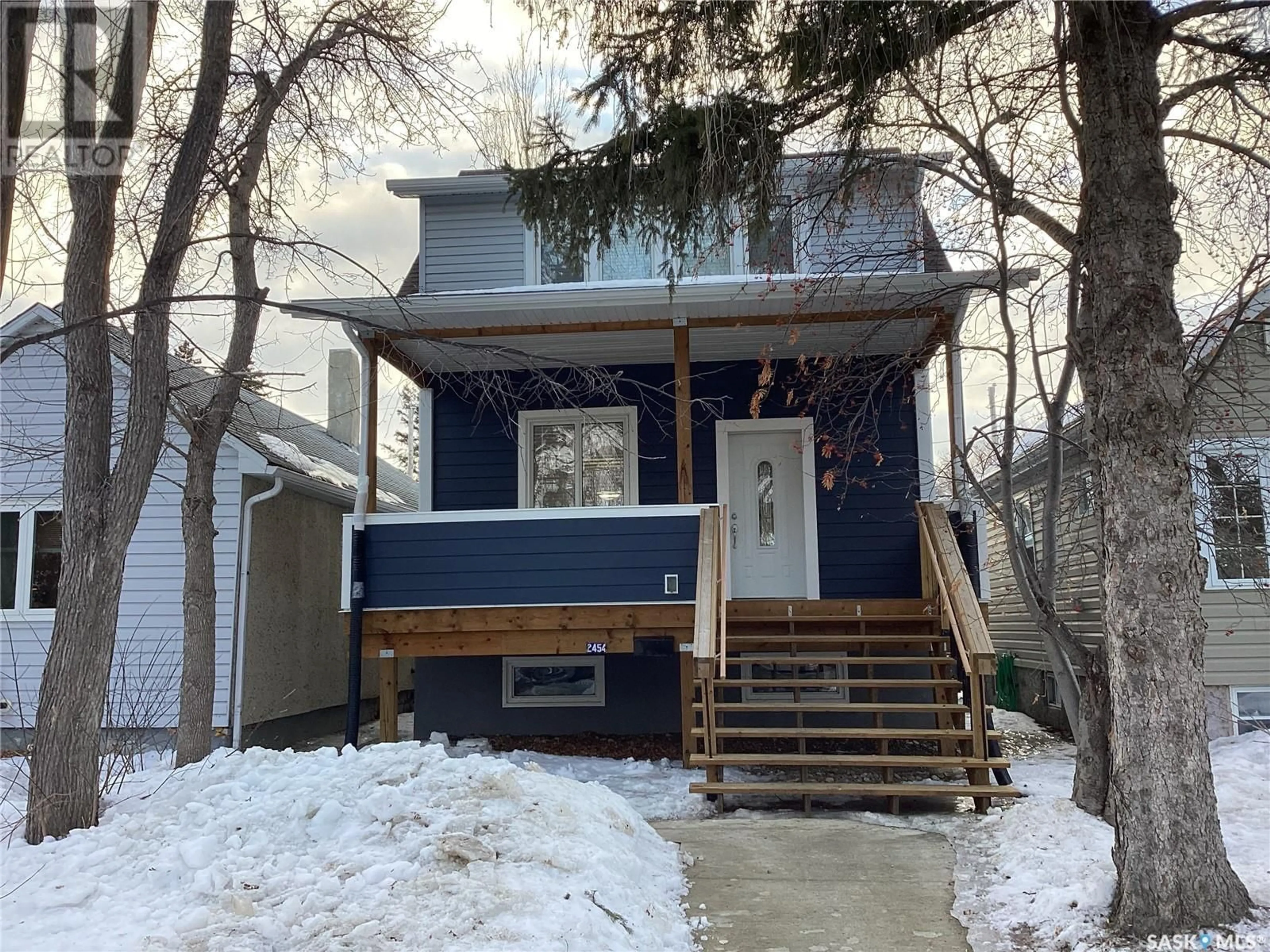 Home with vinyl exterior material, street for 2454 Atkinson STREET, Regina Saskatchewan S4N3X5