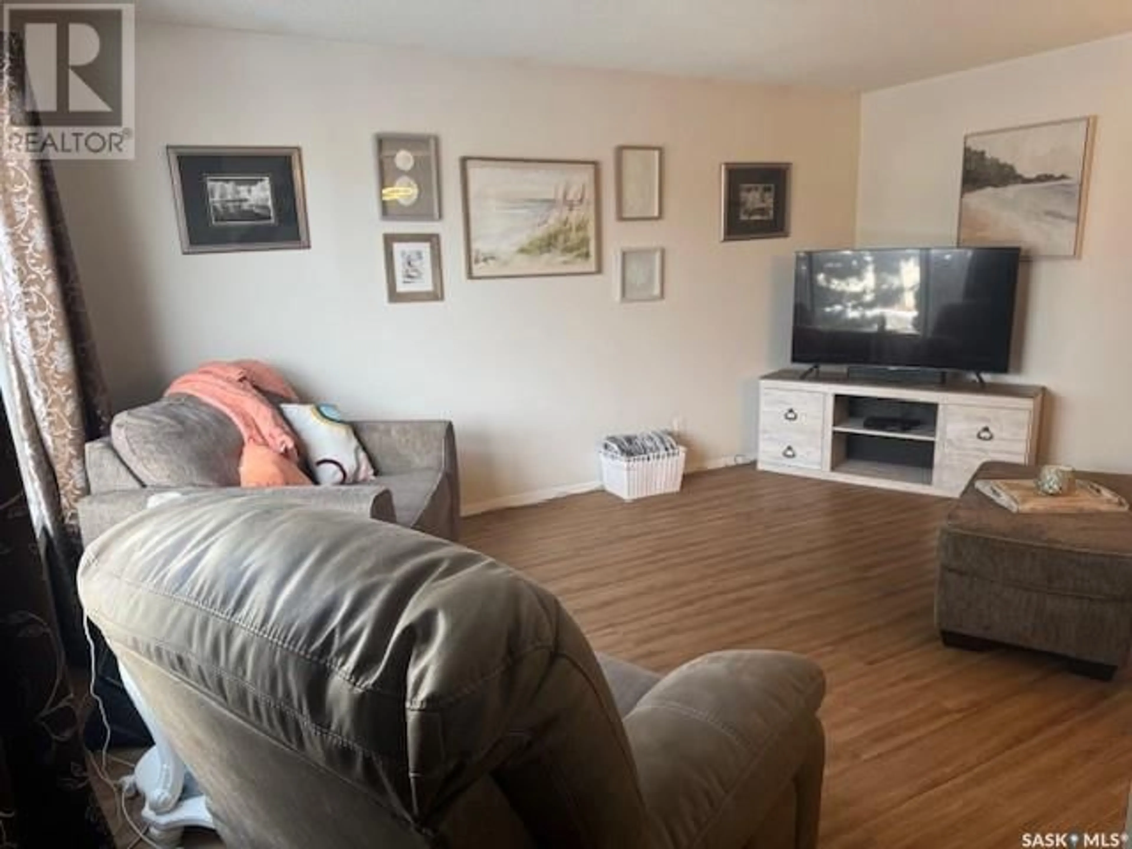 Living room with furniture, unknown for 11310 15th AVENUE, North Battleford Saskatchewan S9A3E5