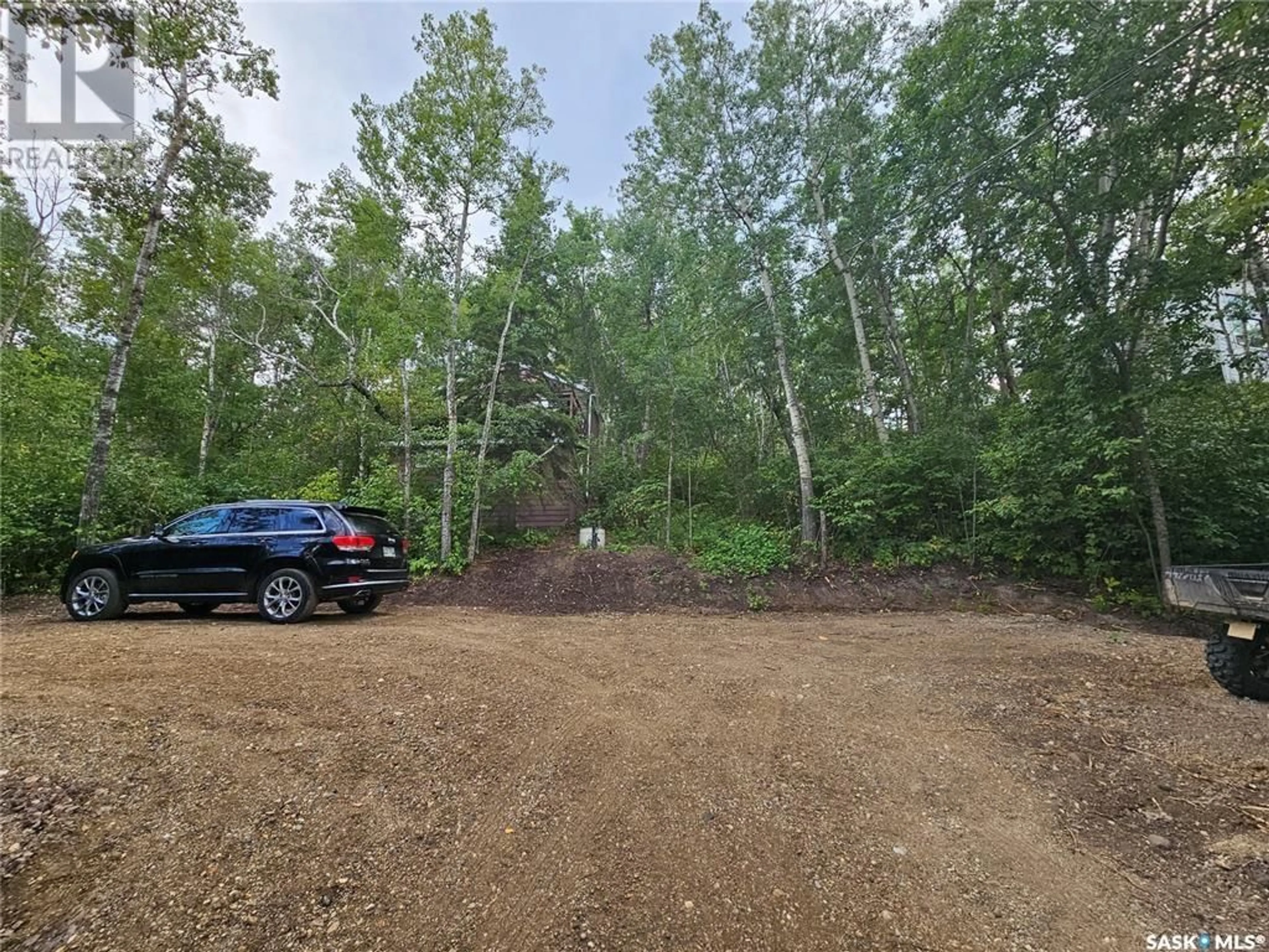 A pic from outside/outdoor area/front of a property/back of a property/a pic from drone, forest/trees view for 170 Waweychapow DRIVE, White Bear Lake Saskatchewan S0C0R0