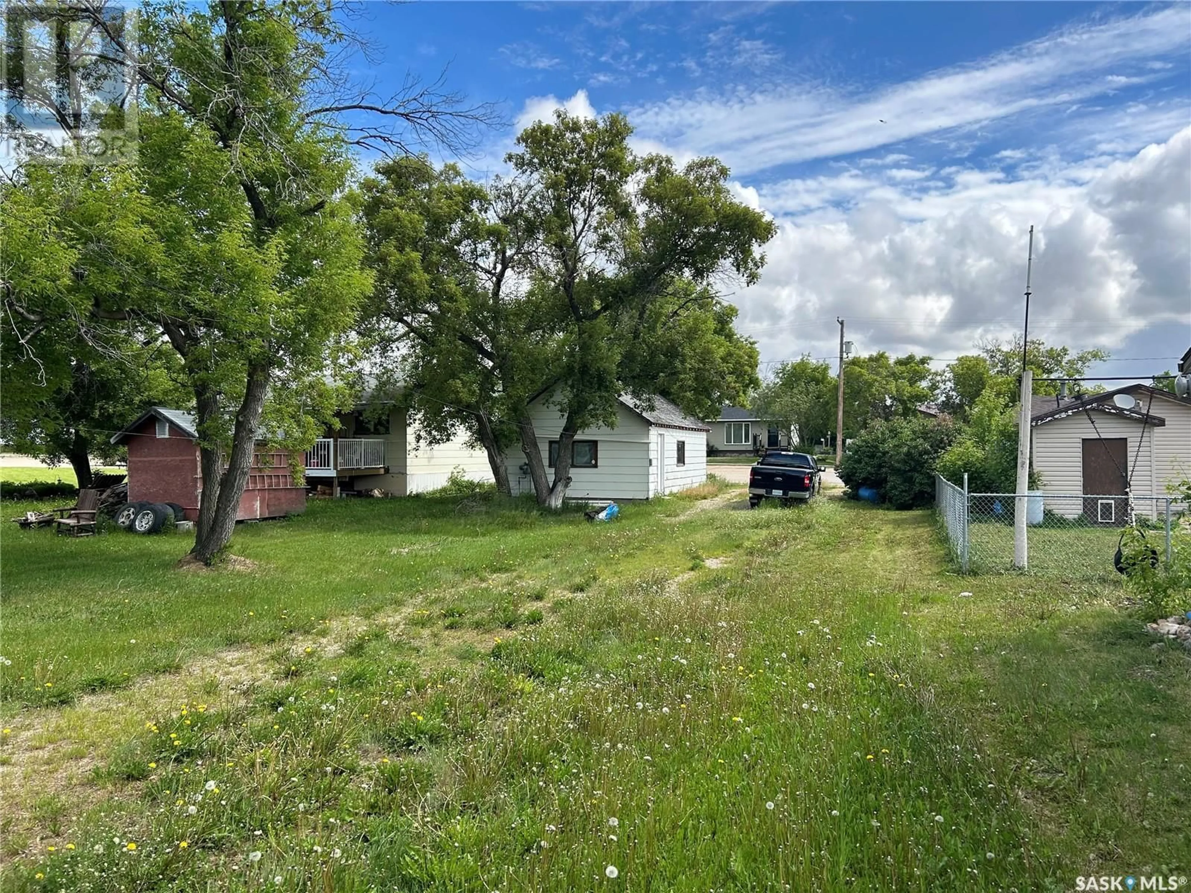 A pic from outside/outdoor area/front of a property/back of a property/a pic from drone, street for 318 2nd AVENUE, Young Saskatchewan S0K4Y0