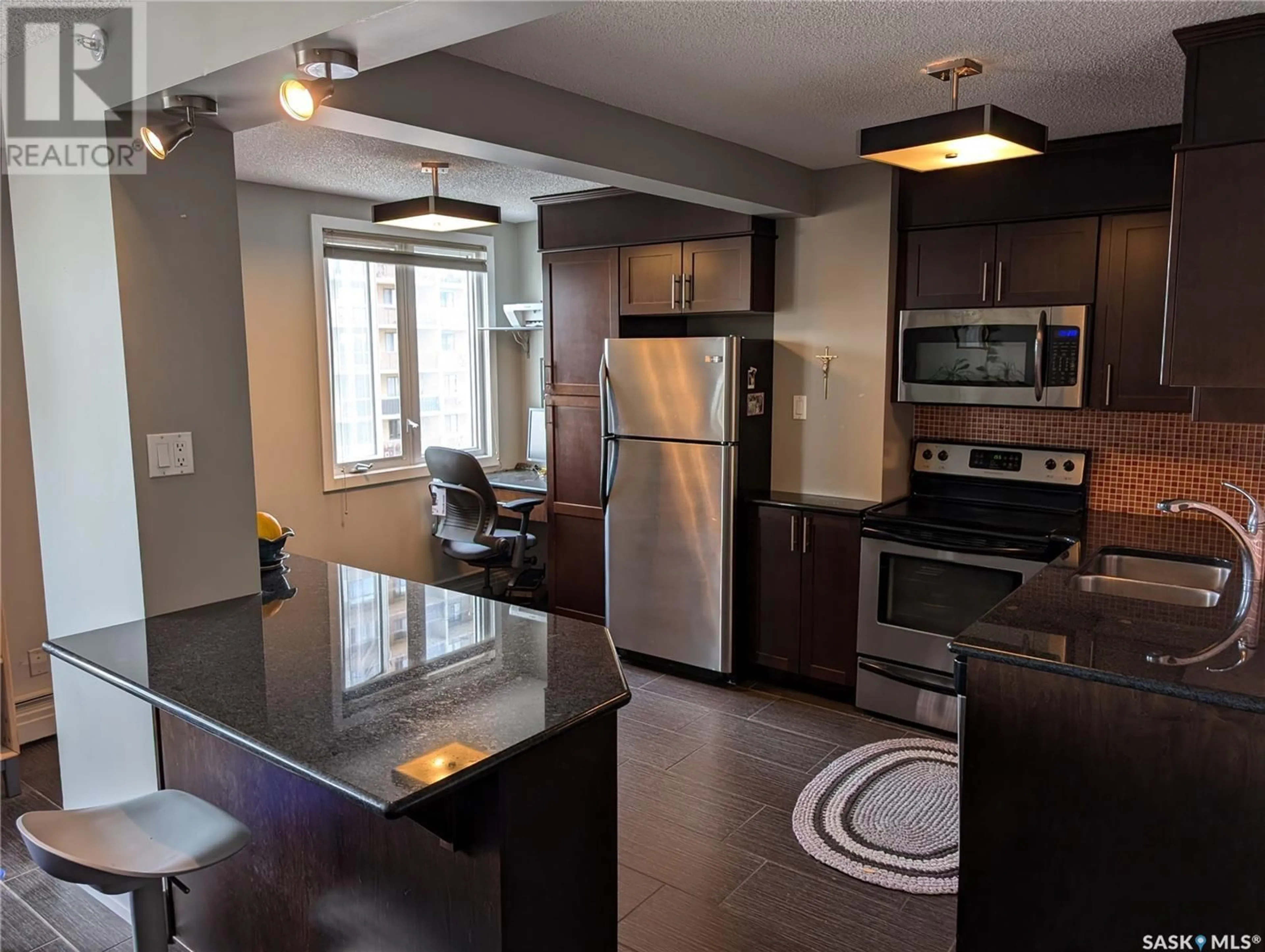 Open concept kitchen, unknown for 1005 320 5th AVENUE N, Saskatoon Saskatchewan S7K2P5