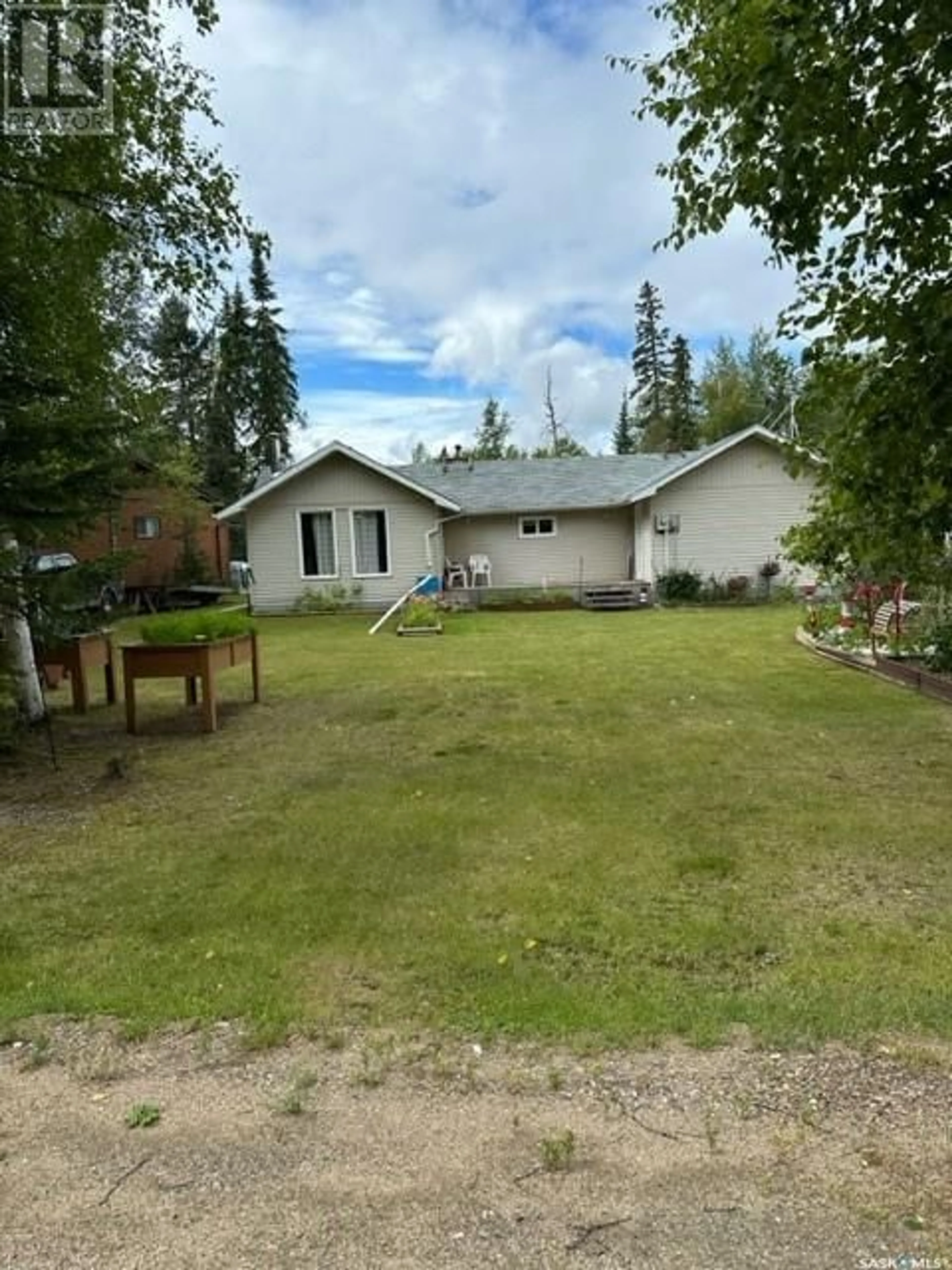 A pic from outside/outdoor area/front of a property/back of a property/a pic from drone, unknown for 711 WASKOS DRIVE, Northern Admin District Saskatchewan S0J3G0