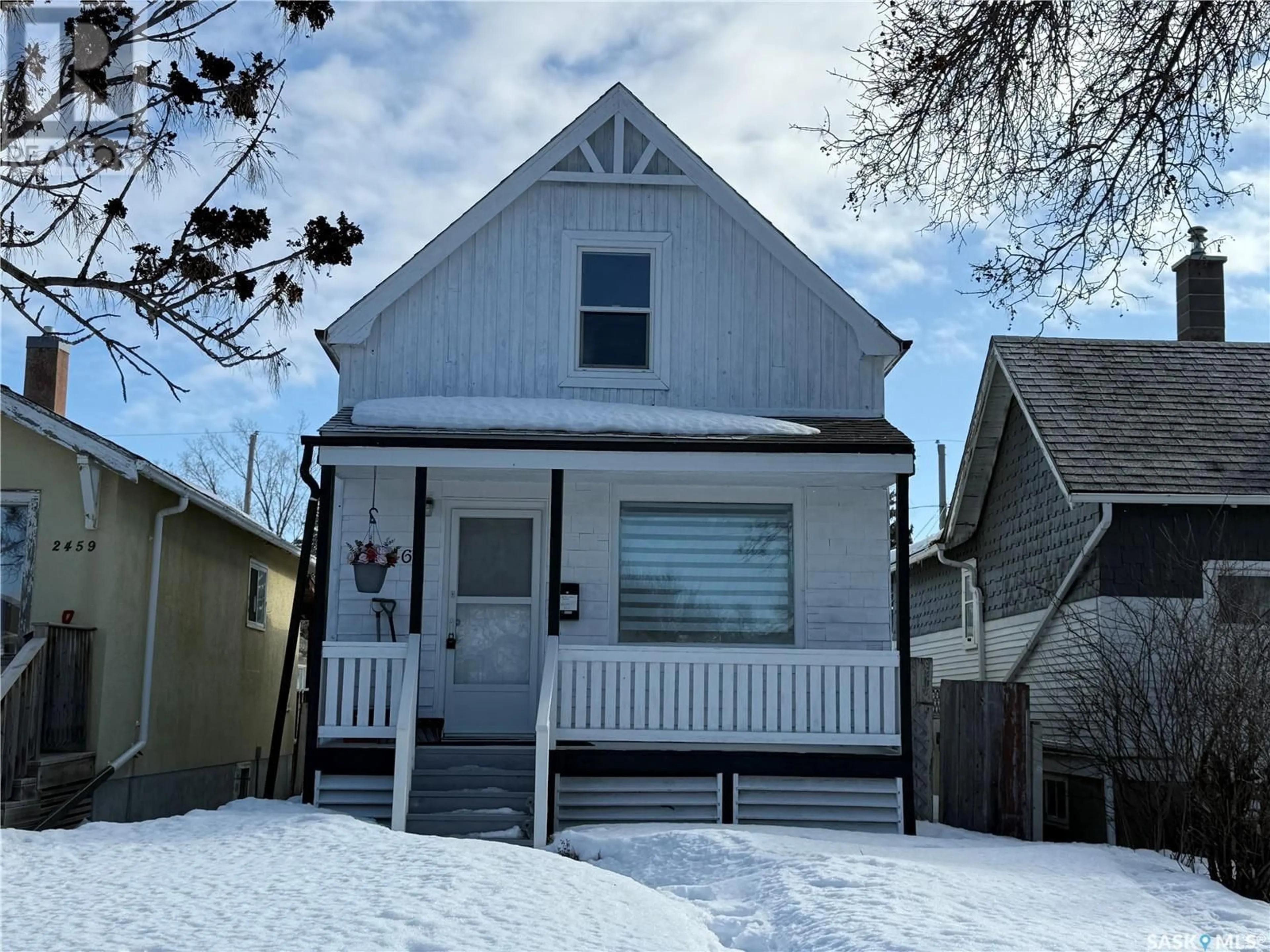 Home with vinyl exterior material, street for 2465 ELLIOTT STREET, Regina Saskatchewan S4N3H4