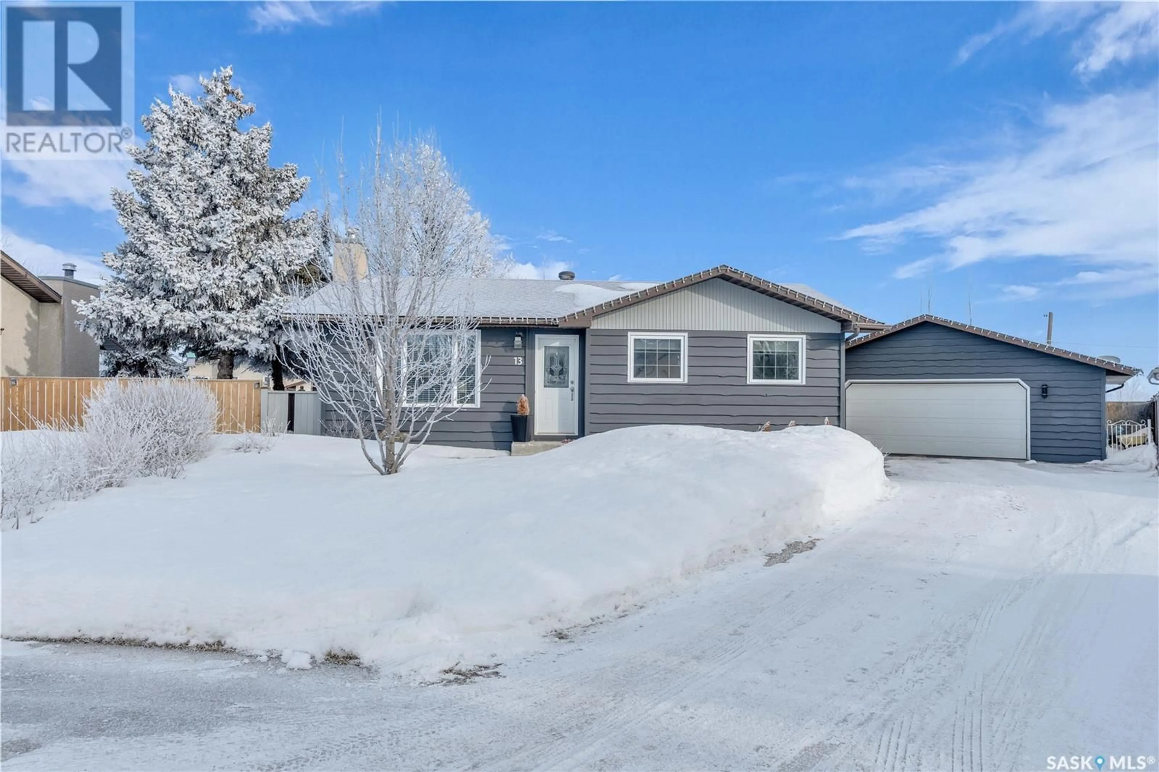 Home with vinyl exterior material, street for 13 Curry BAY, Balgonie Saskatchewan S0G0E0