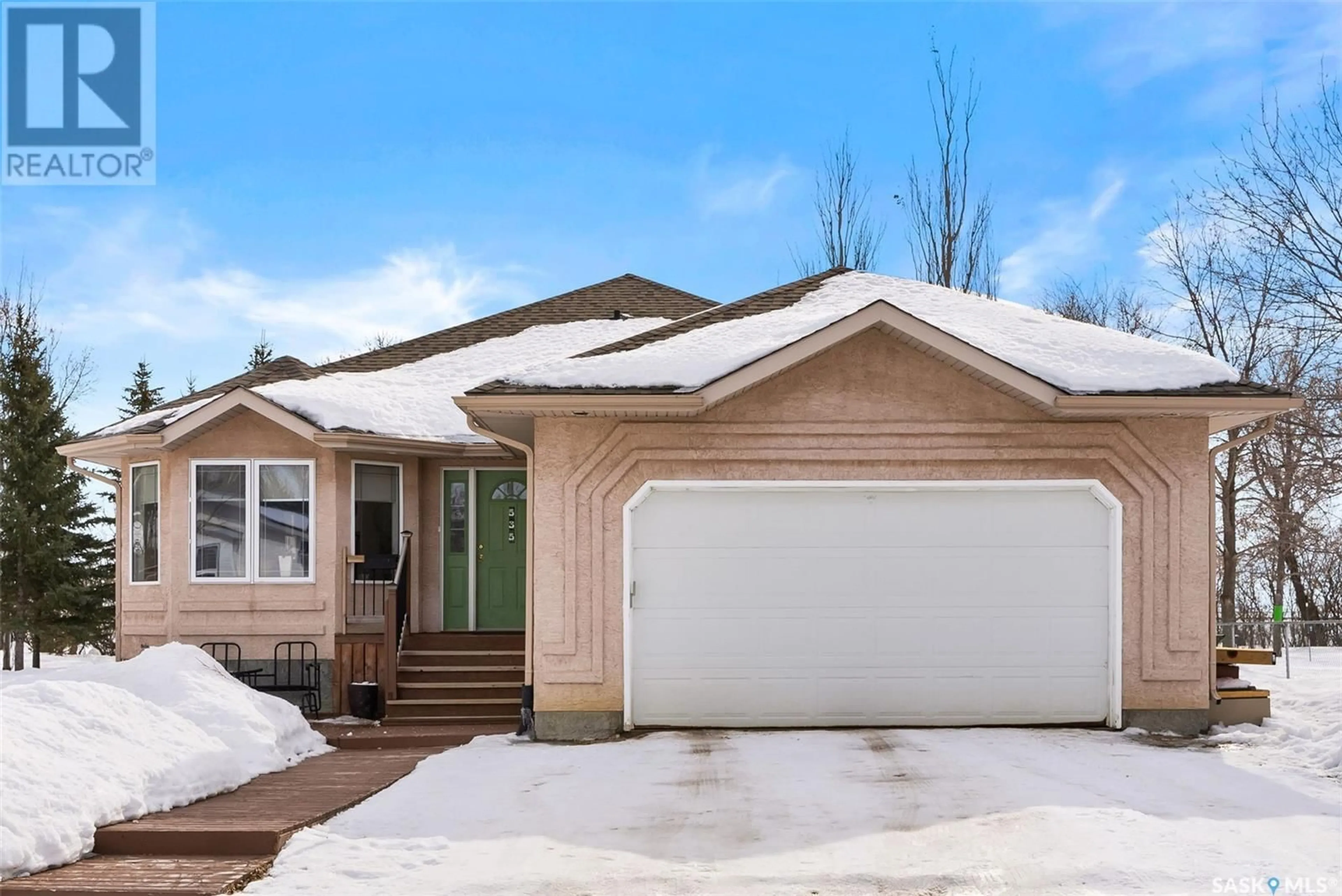 Home with vinyl exterior material, street for 535 Carroll CRESCENT, Southey Saskatchewan S0G4P0