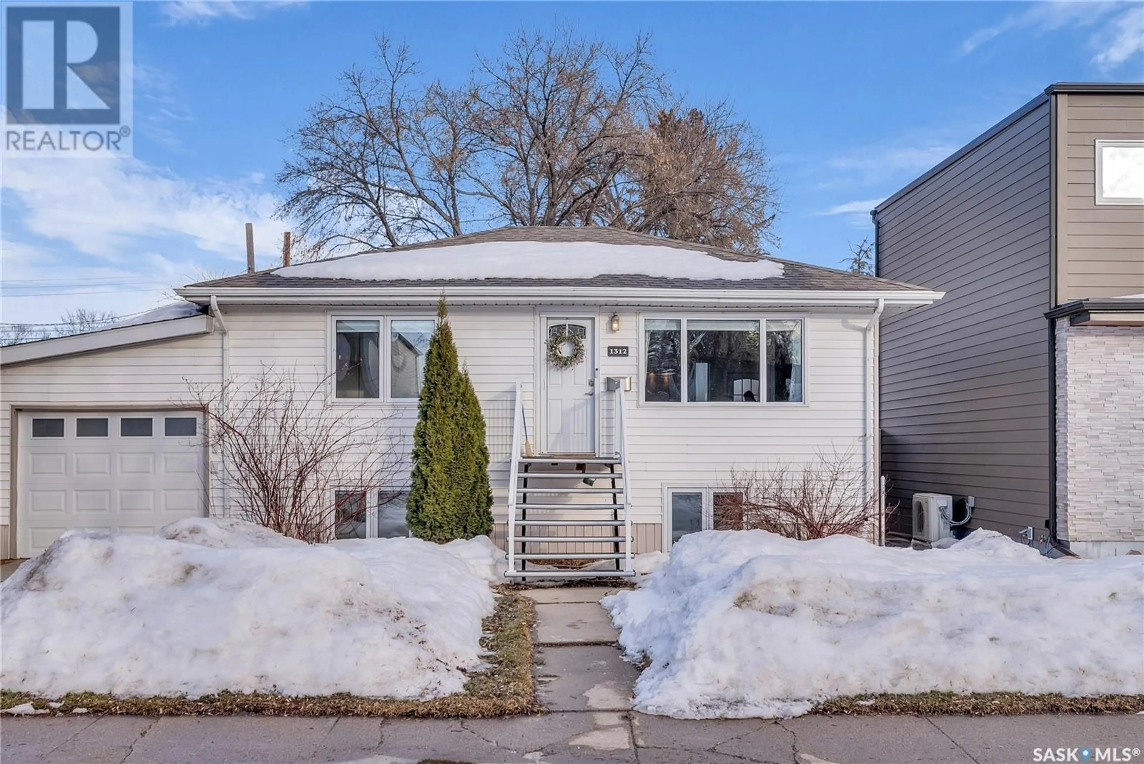 Home with vinyl exterior material, street for 1312 Edward AVENUE, Saskatoon Saskatchewan S7K3B1