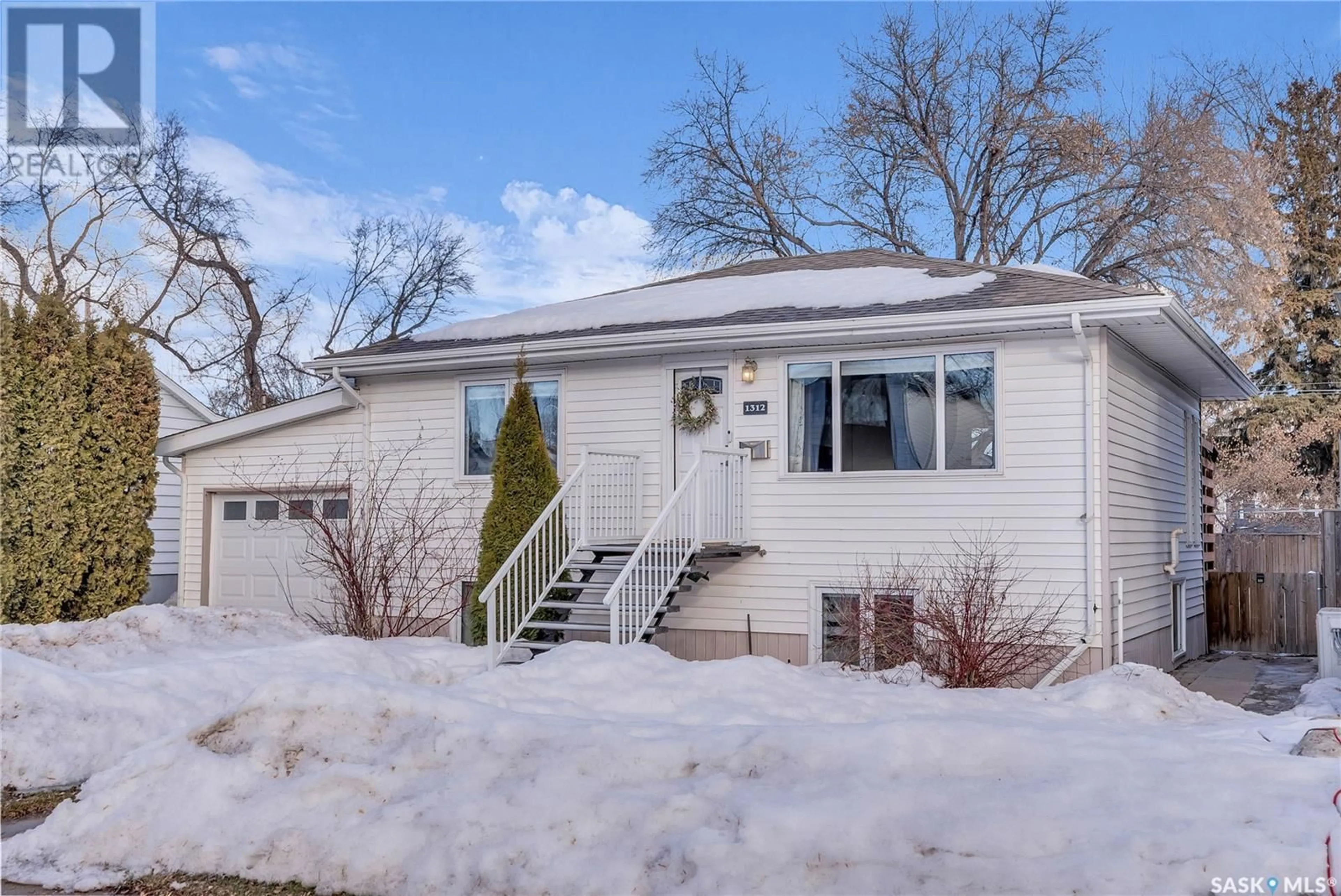 Home with vinyl exterior material, street for 1312 Edward AVENUE, Saskatoon Saskatchewan S7K3B1