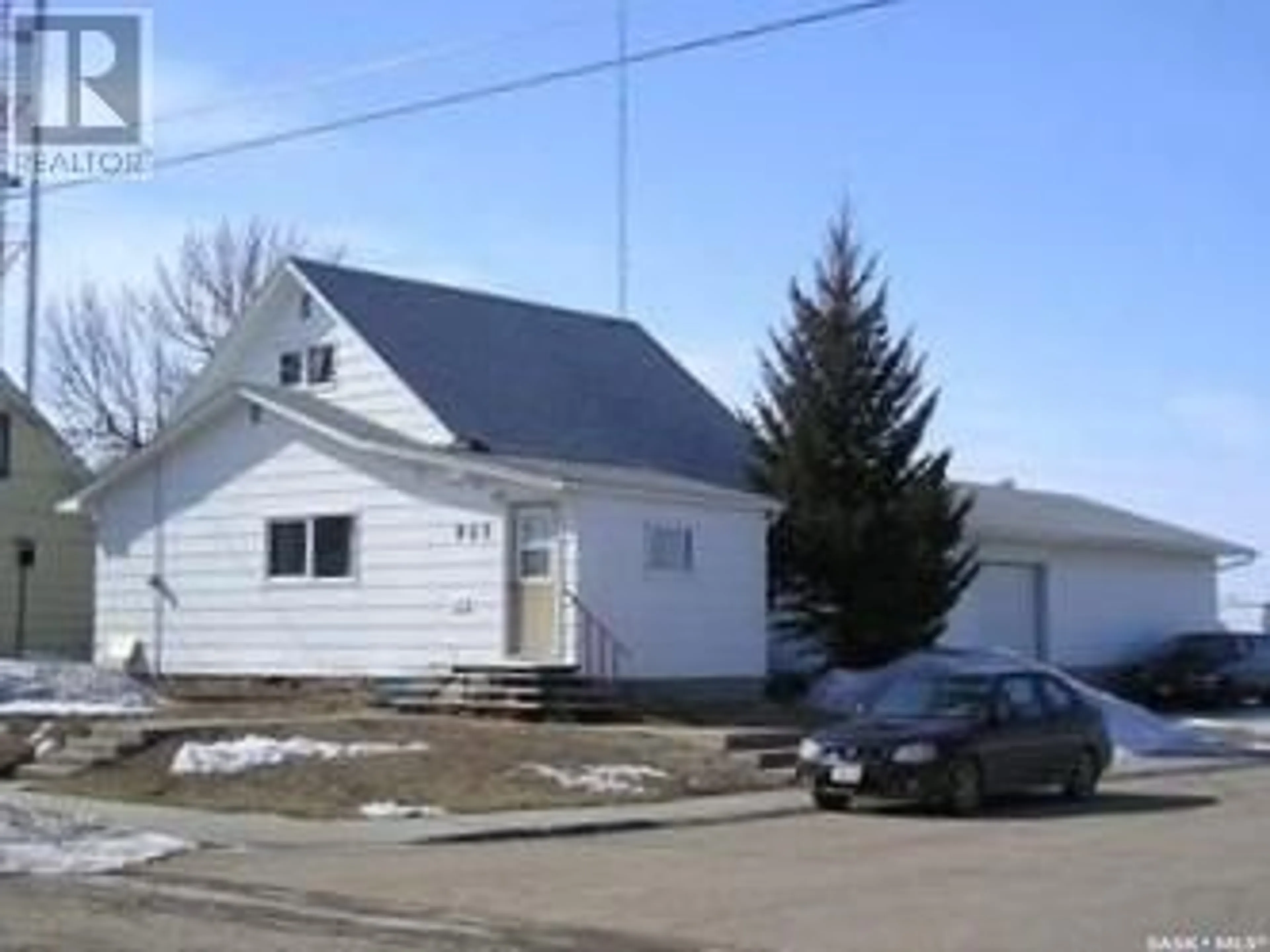 A pic from outside/outdoor area/front of a property/back of a property/a pic from drone, street for 903 4TH STREET, Weyburn Saskatchewan S4H2G6