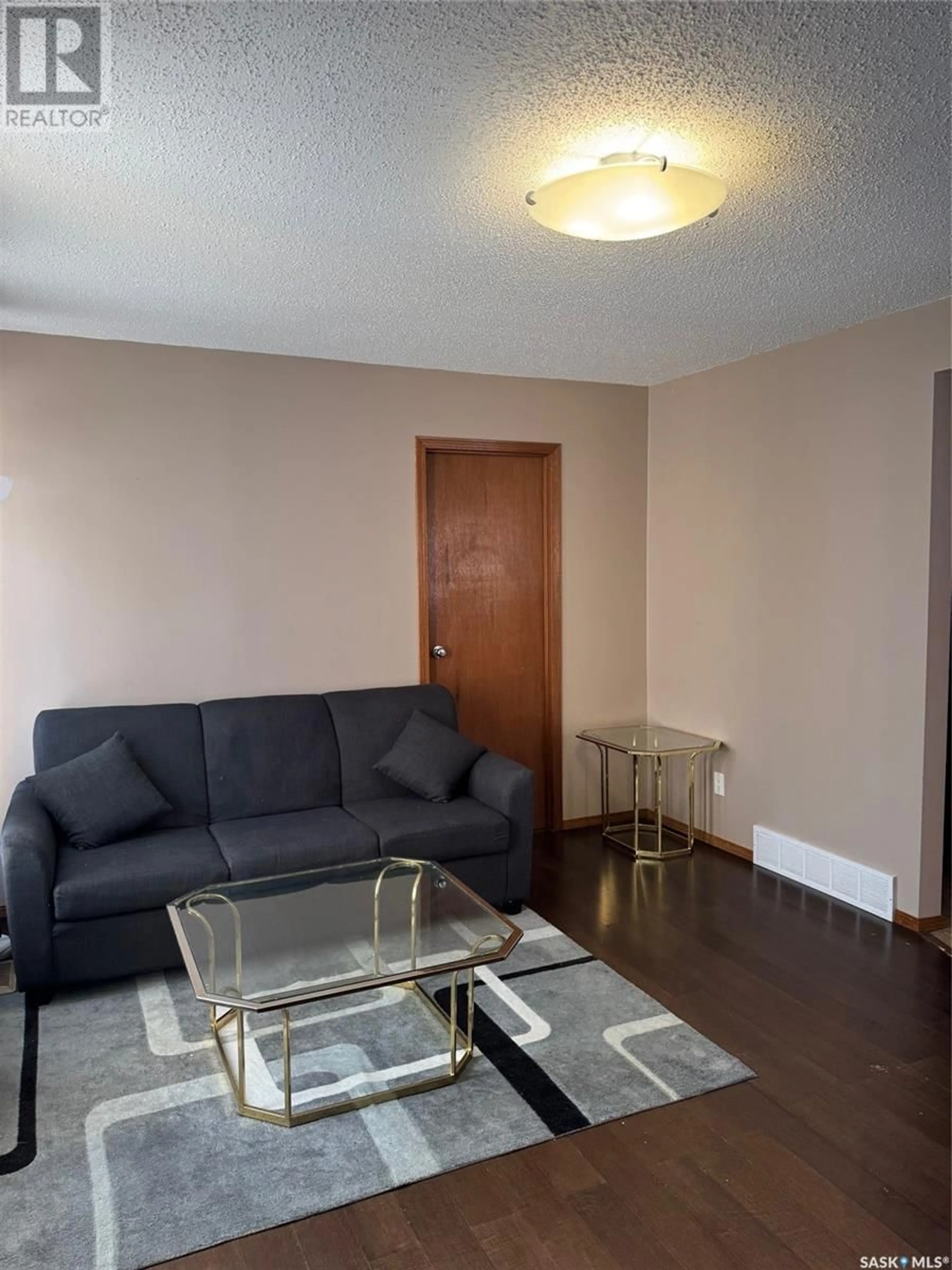 Living room with furniture, unknown for 1381 106th STREET, North Battleford Saskatchewan S9A1X3