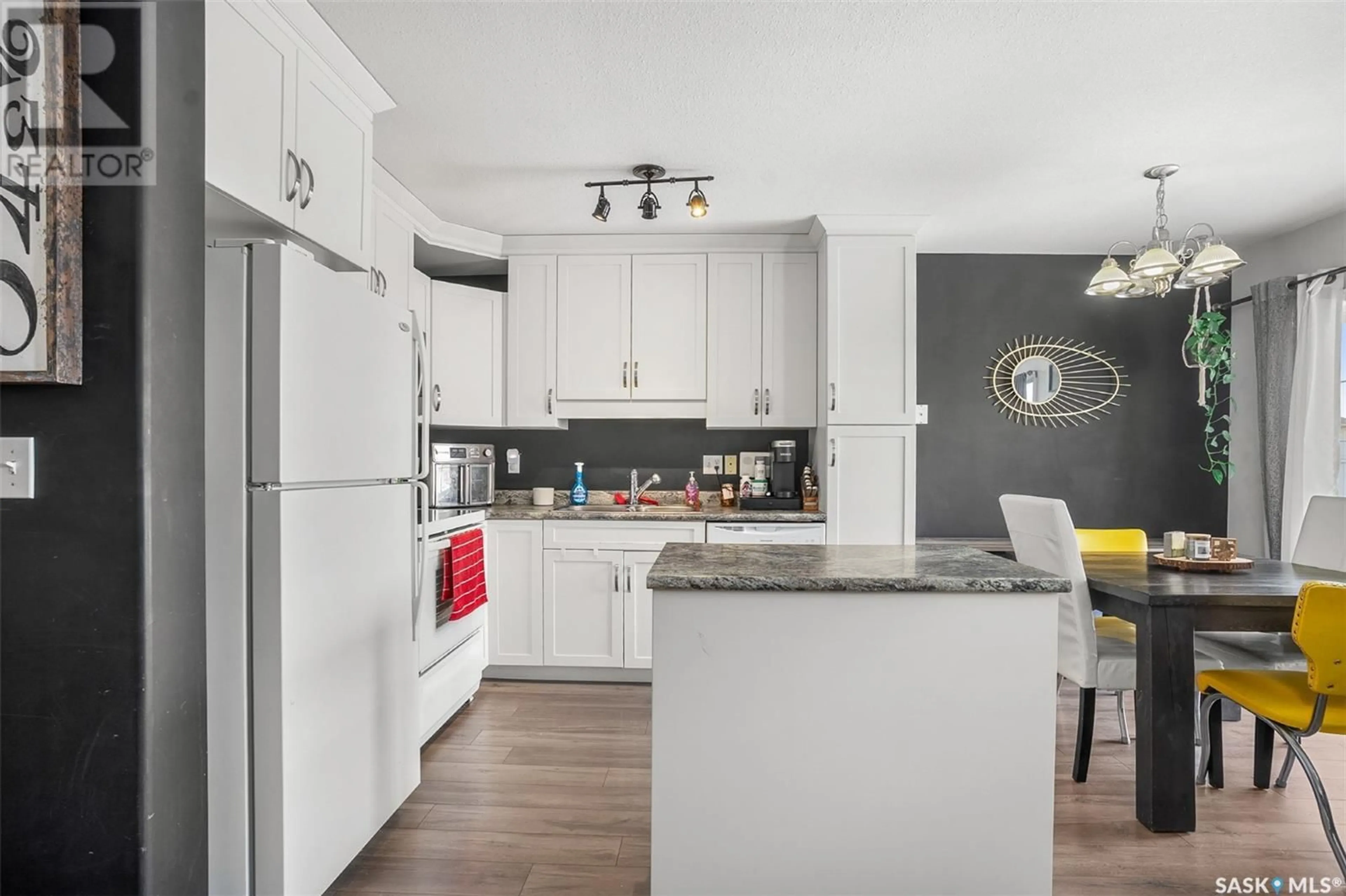 Open concept kitchen, ceramic/tile floor for 47 111 Fairbrother CRESCENT, Saskatoon Saskatchewan S7S1L3