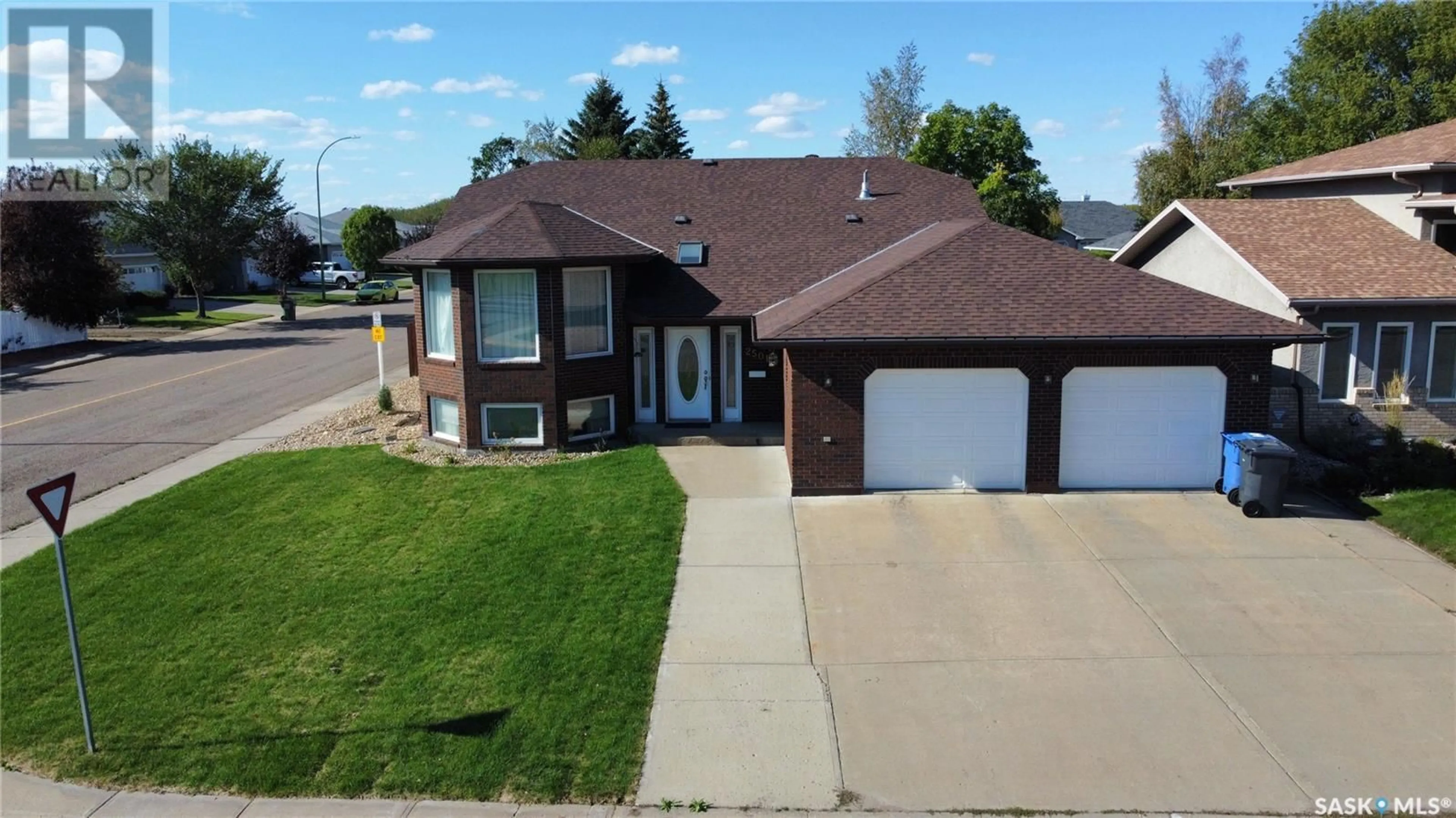 A pic from outside/outdoor area/front of a property/back of a property/a pic from drone, street for 2501 BLUE JAY CRESCENT, North Battleford Saskatchewan S9A3Z3