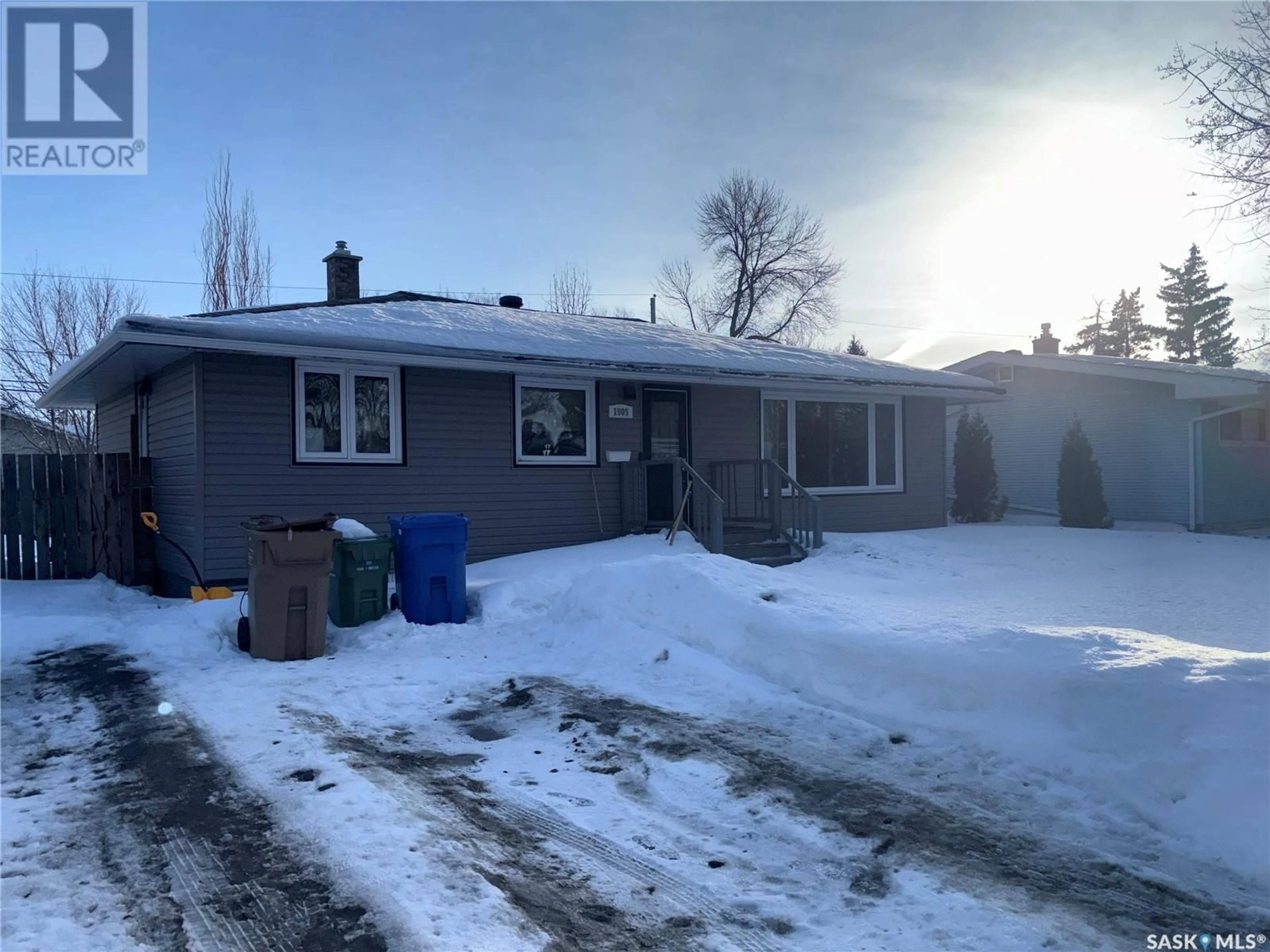 Home with vinyl exterior material, street for 1905 Grant DRIVE, Regina Saskatchewan S4S4V6