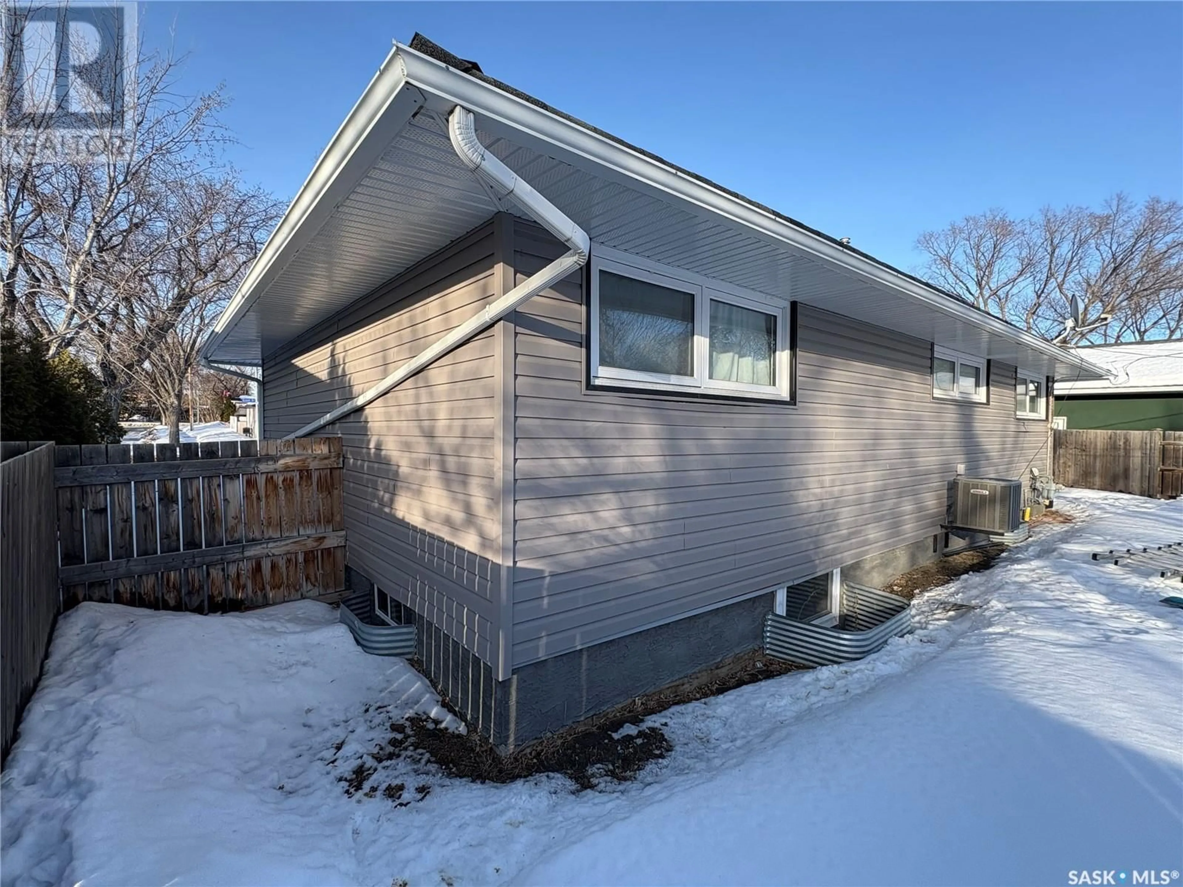 Home with vinyl exterior material, street for 1905 Grant DRIVE, Regina Saskatchewan S4S4V6