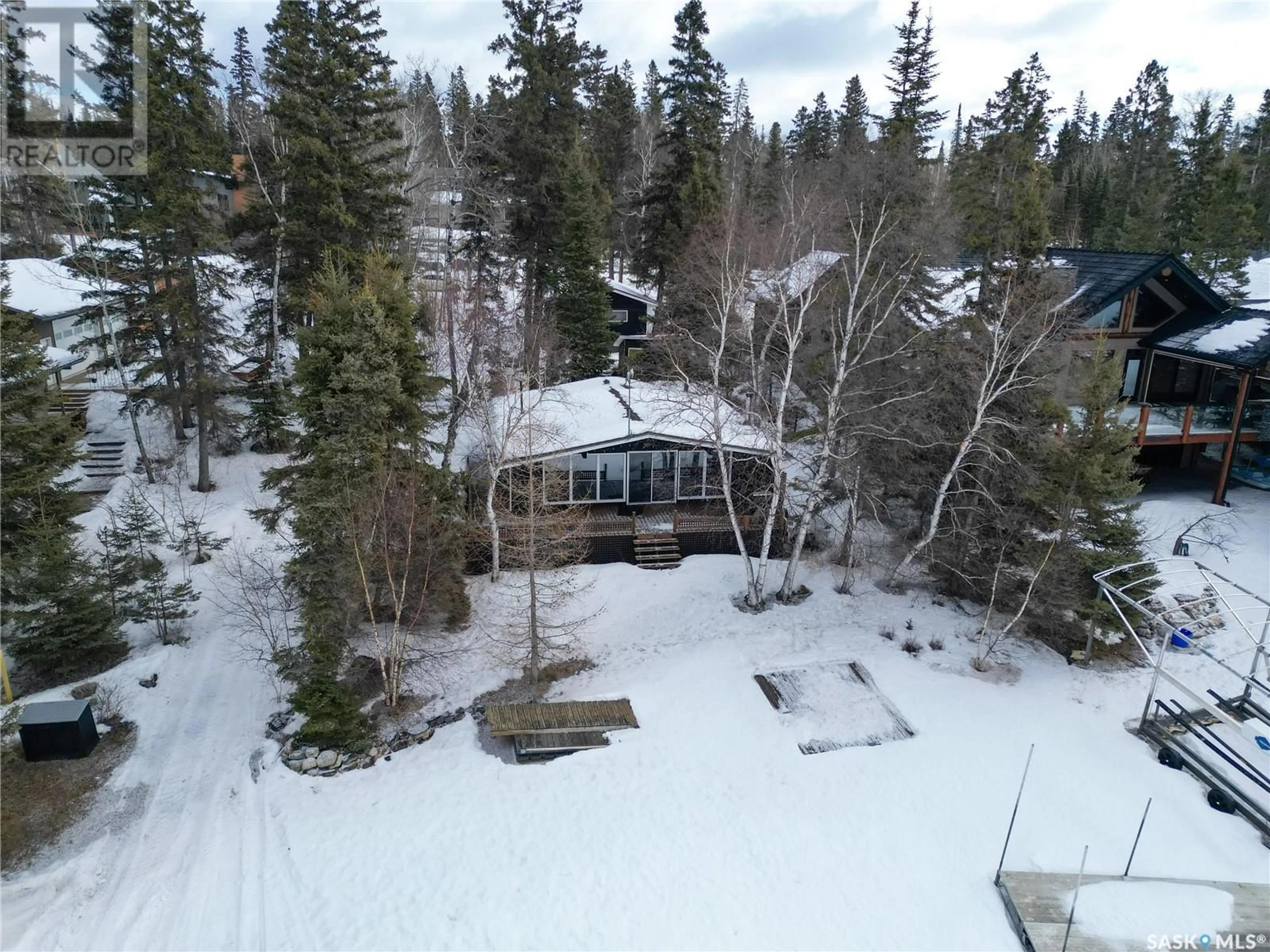 A pic from outside/outdoor area/front of a property/back of a property/a pic from drone, forest/trees view for 614 Marine DRIVE, Emma Lake Saskatchewan S0J0N0