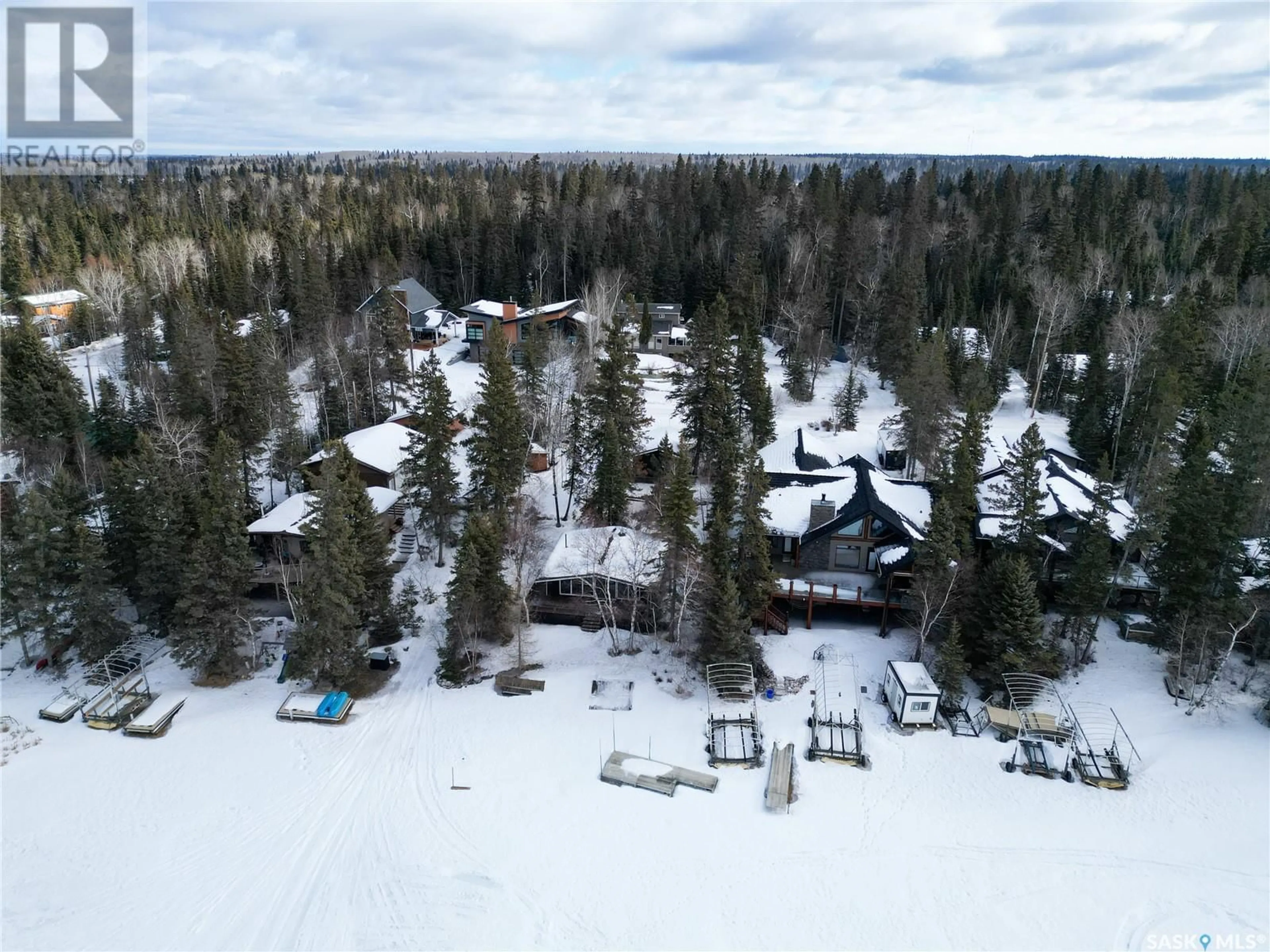 A pic from outside/outdoor area/front of a property/back of a property/a pic from drone, forest/trees view for 614 Marine DRIVE, Emma Lake Saskatchewan S0J0N0