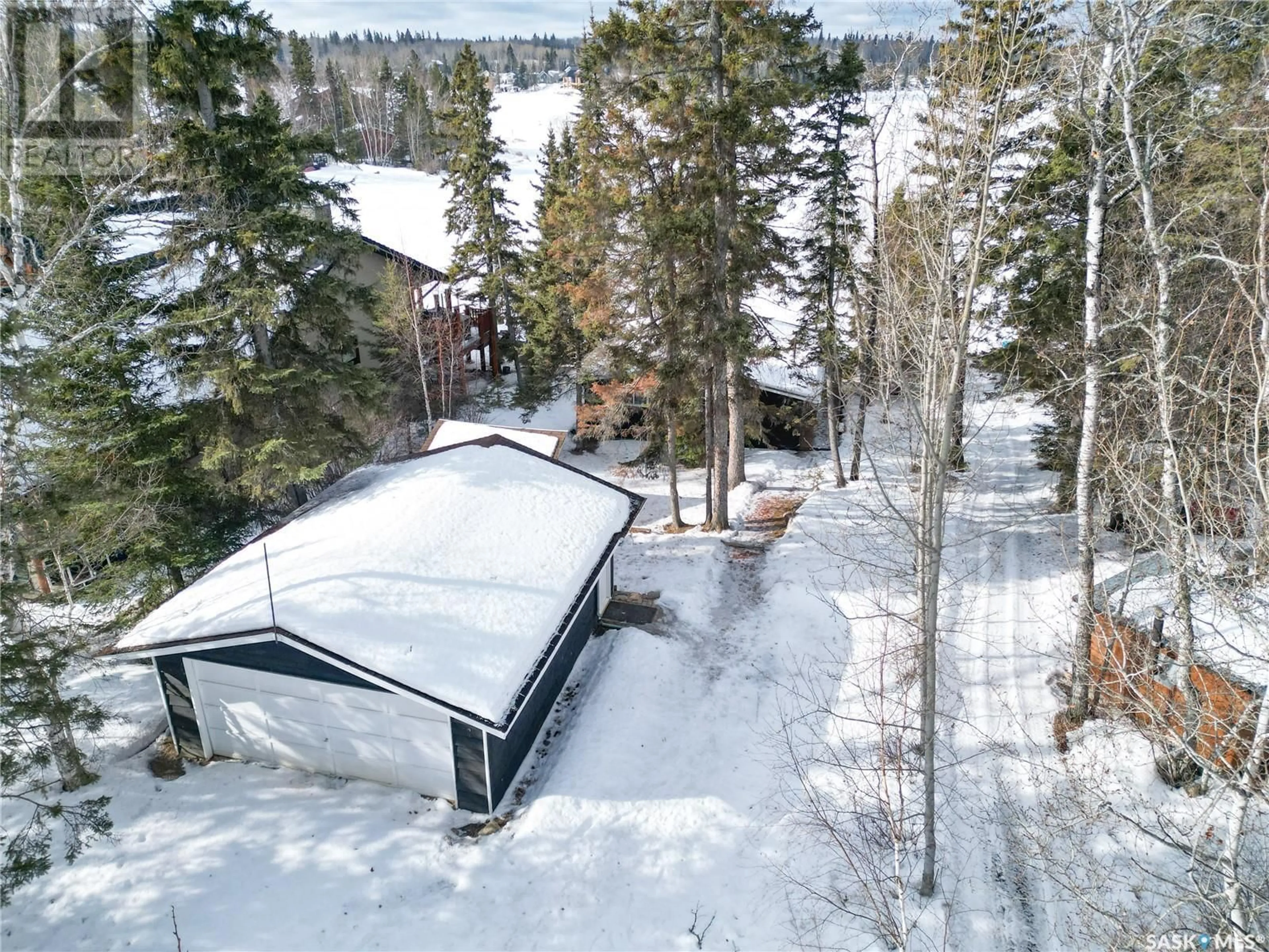 A pic from outside/outdoor area/front of a property/back of a property/a pic from drone, forest/trees view for 614 Marine DRIVE, Emma Lake Saskatchewan S0J0N0