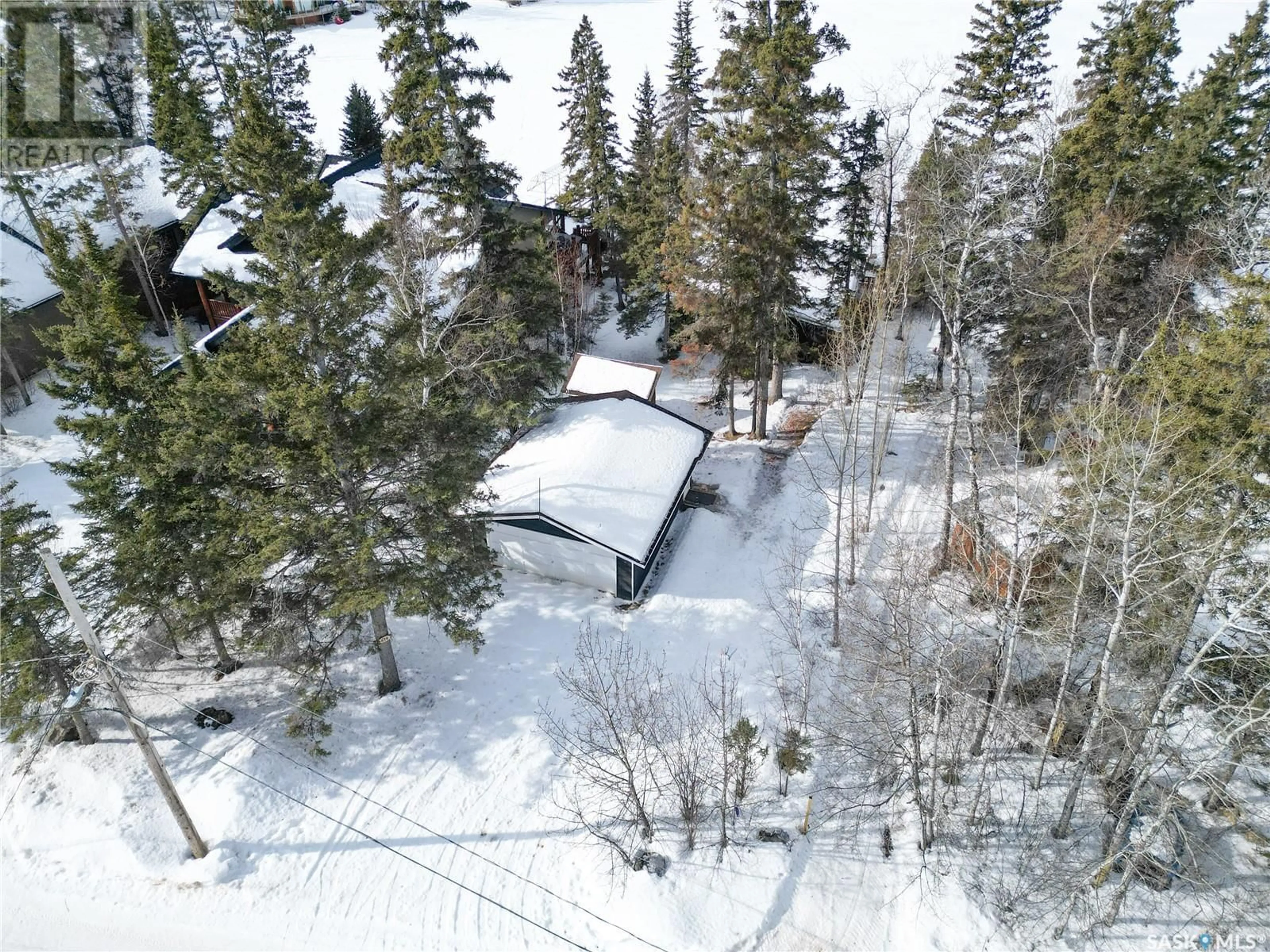 A pic from outside/outdoor area/front of a property/back of a property/a pic from drone, forest/trees view for 614 Marine DRIVE, Emma Lake Saskatchewan S0J0N0