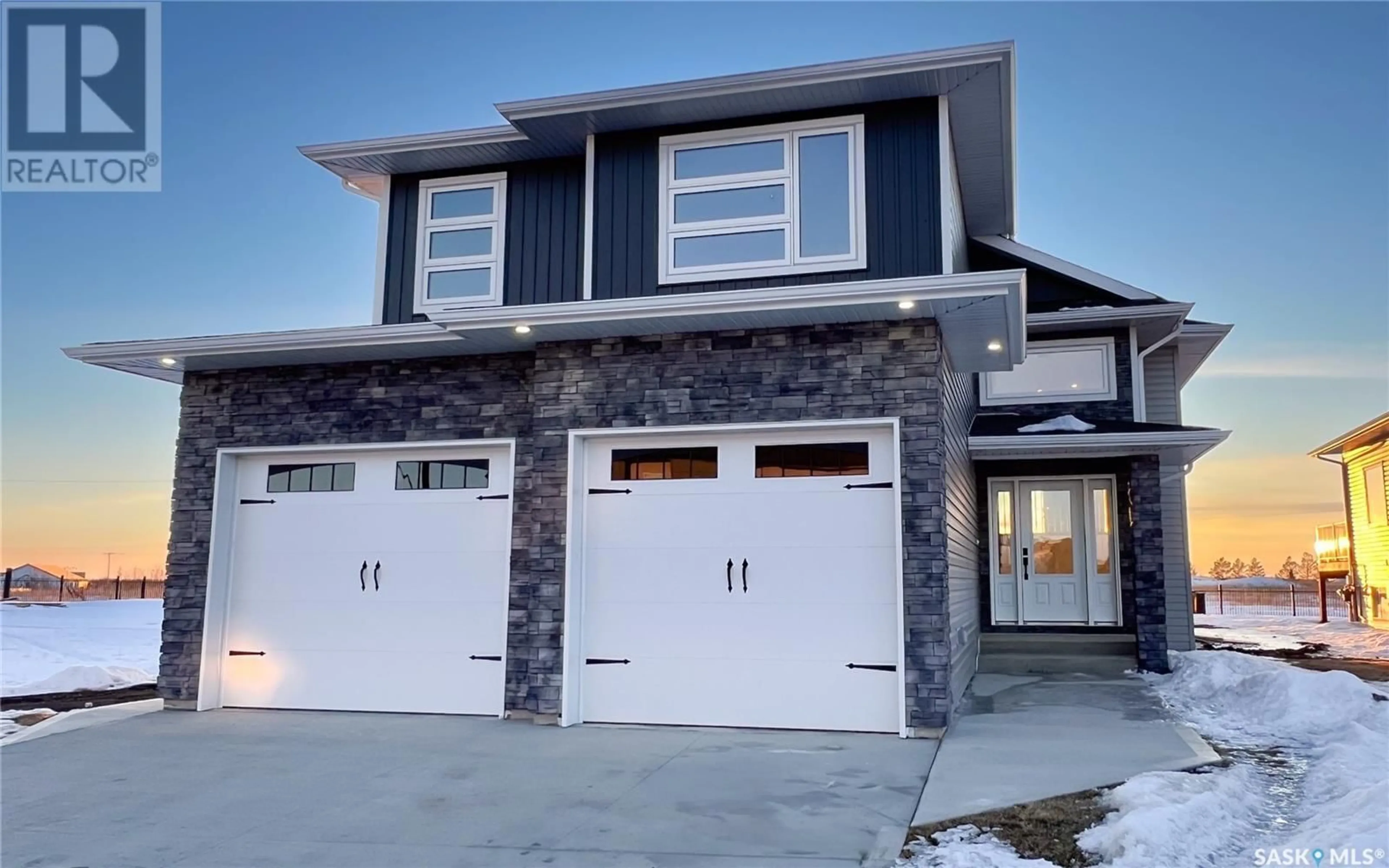 Home with brick exterior material, street for 918 Bentley MANOR, Saskatoon Saskatchewan S7L6P4