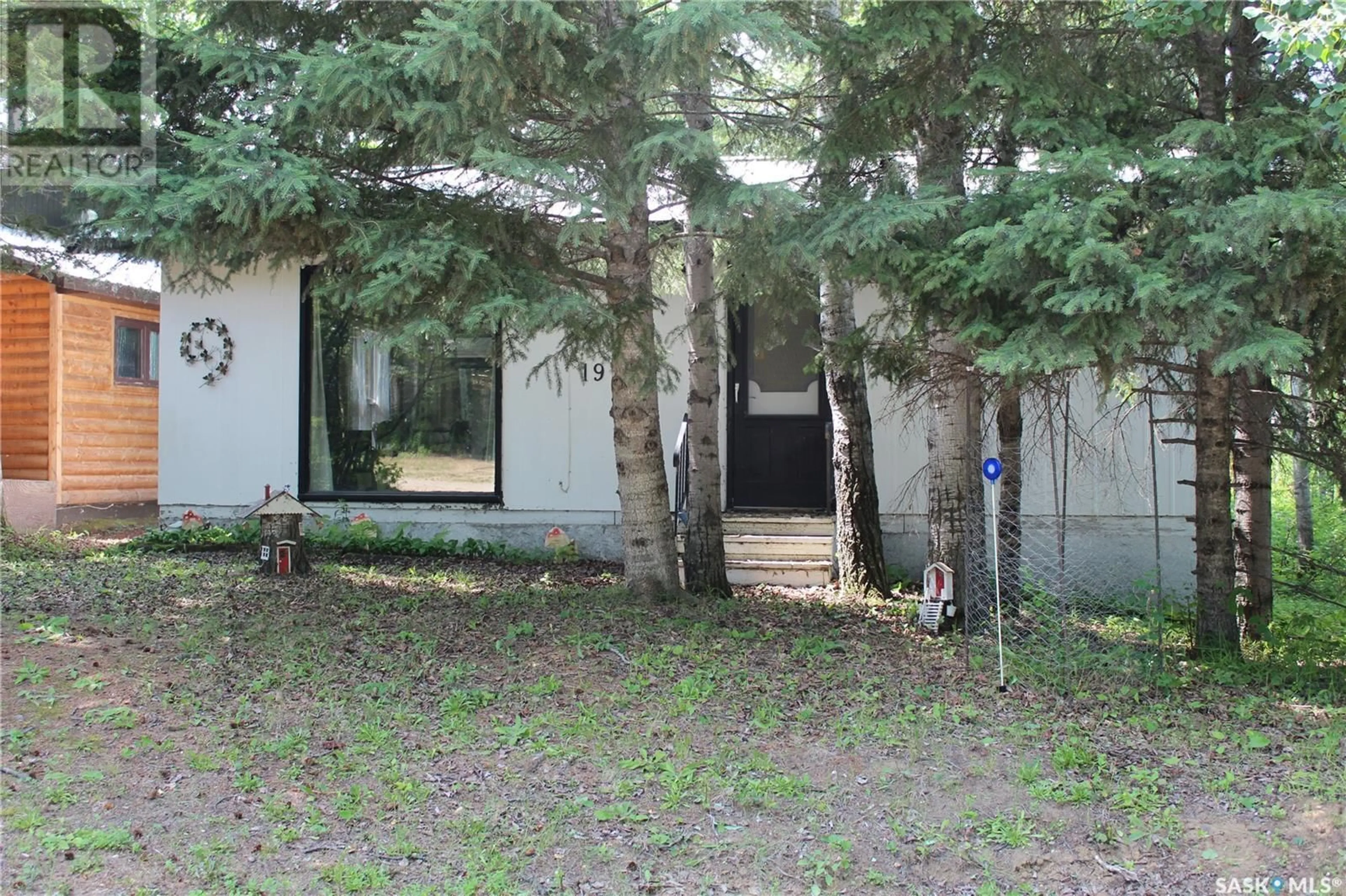 Patio, forest/trees view for 19 Struthers DRIVE, Struthers Lake Saskatchewan S0J0A6