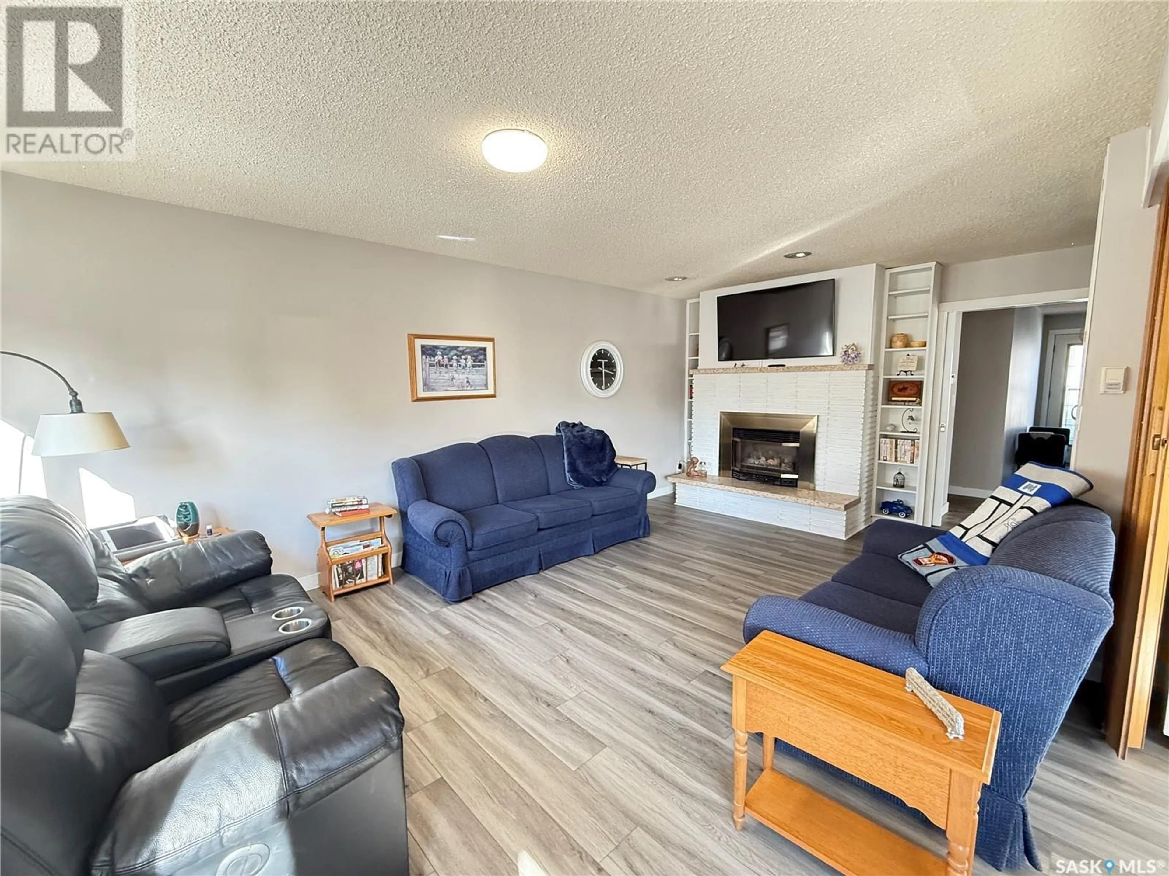 Living room with furniture, unknown for 401 5th STREET NE, Weyburn Saskatchewan S4H0Z7